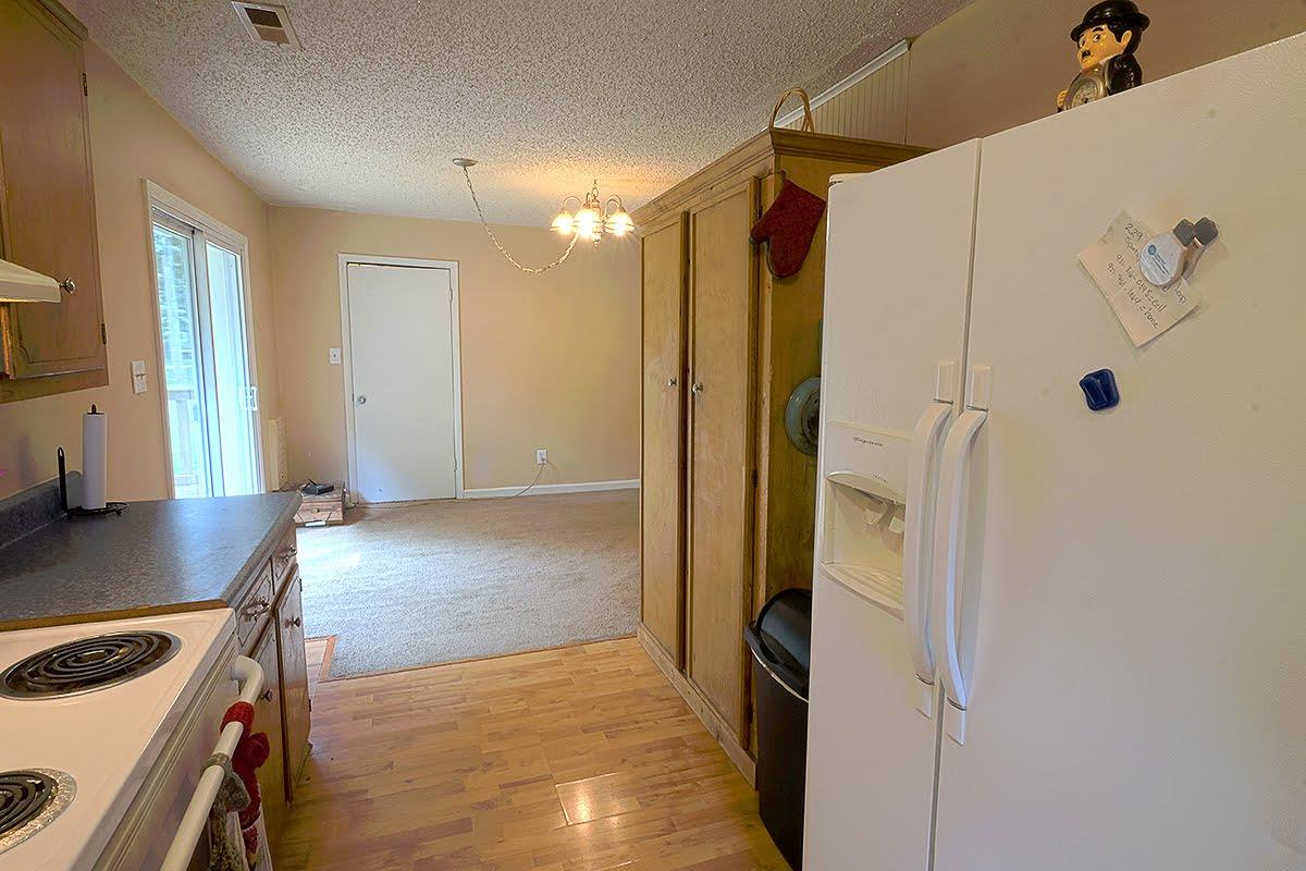 2779 Dale Ridge Road Dowelltown, TN 37059 - Photo 8 of 20 a view of kitchen with stainless steel appliances cabinets and wooden floor