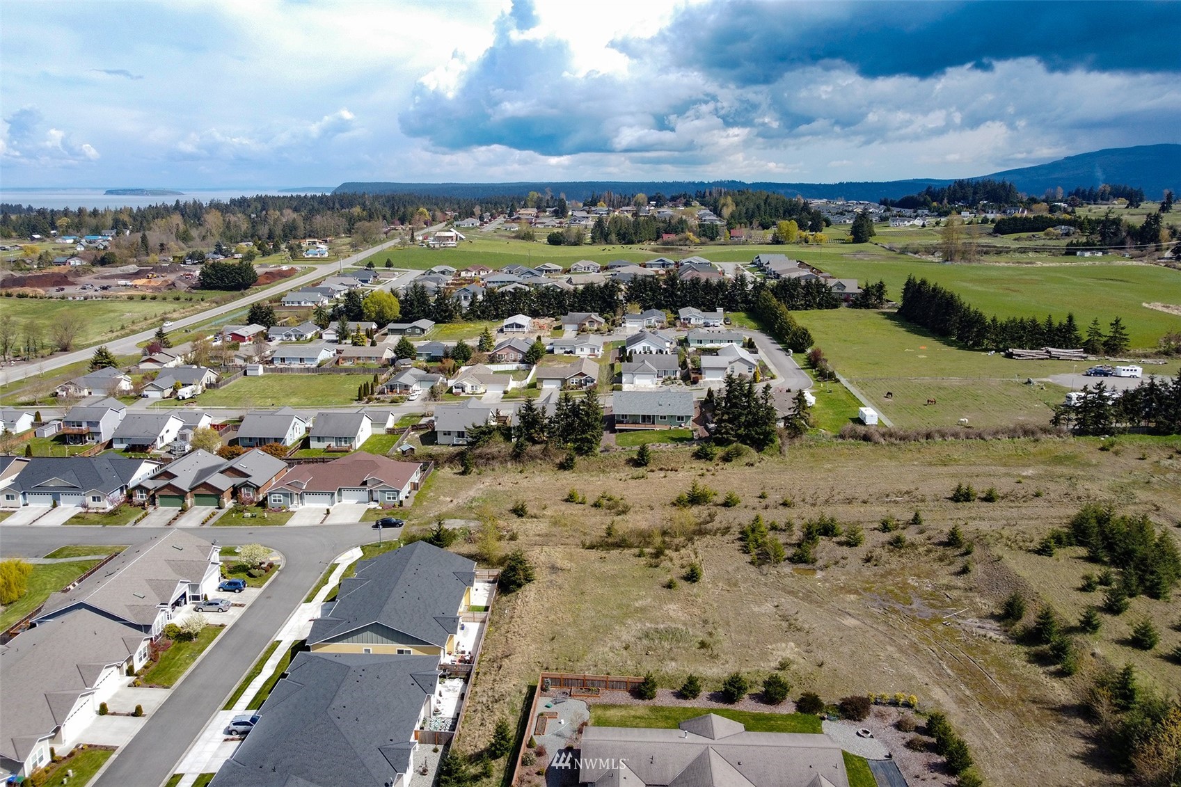 9999 Stratus Loop Sequim, WA 98382 - Photo 38 of 40 an aerial view of a city