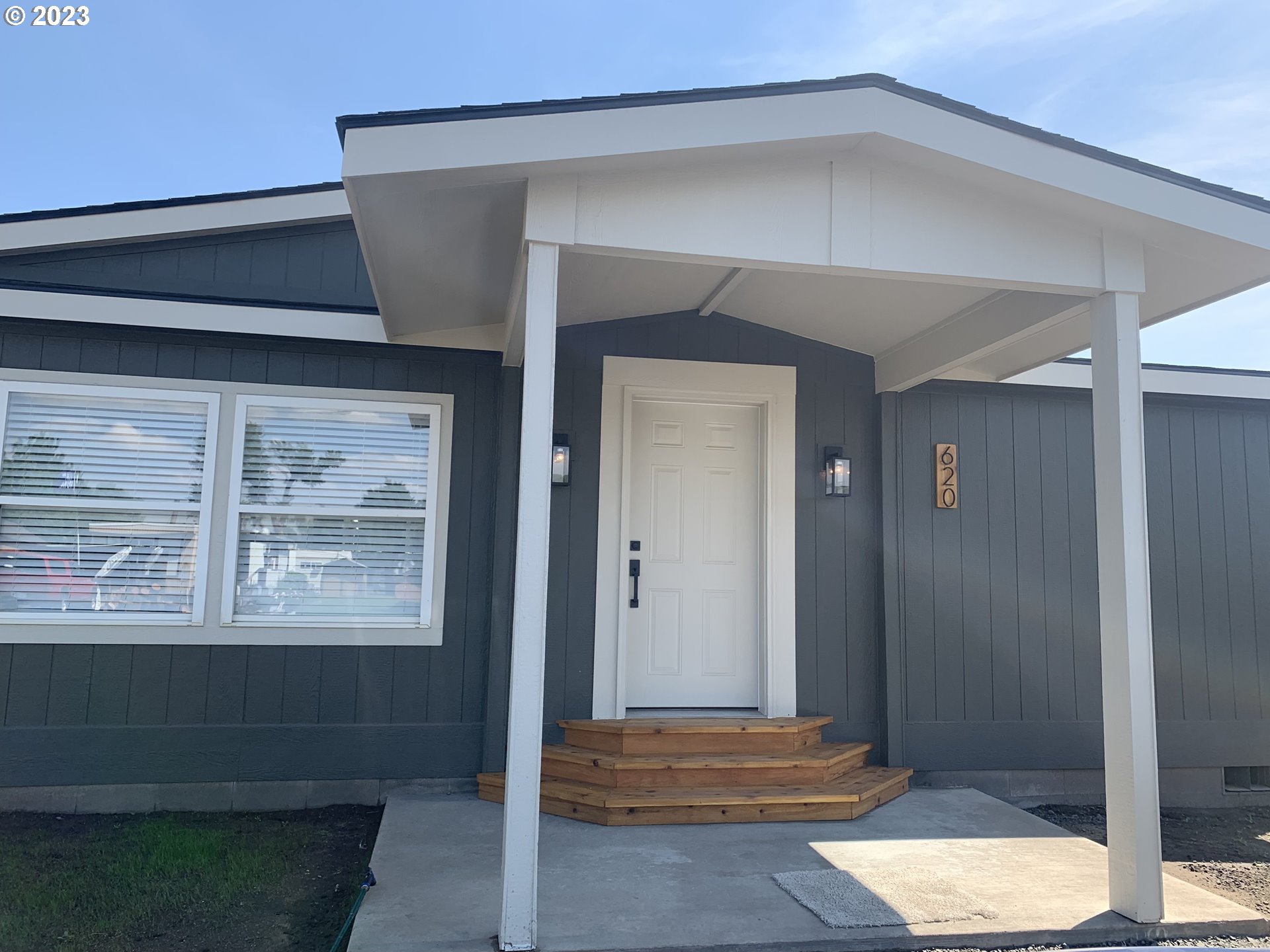 620 Southwest Mildred Avenue Enterprise, OR 97828 - Photo 3 of 26 a view of a hallway with wooden floor and a cabinet