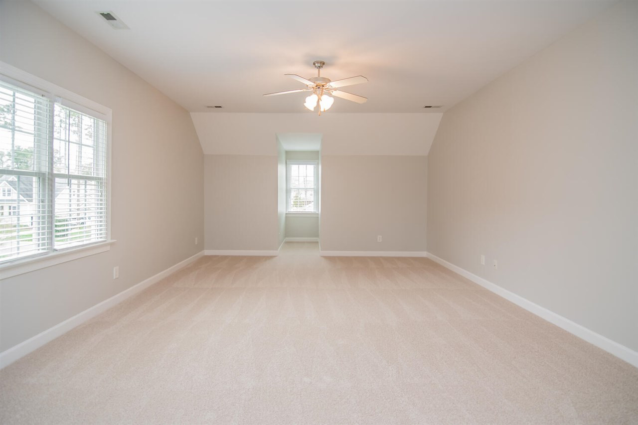 1614 Weatherford Circle Raleigh, NC 27604 - Photo 7 of 12 Upstairs this bonus room is huge! NEW CARPET in bedrooms and bonus. Also, check out the size of the two additional bedrooms upstairs - they are both HUGE! There is also a ton of storage space in this home. Bonus Room