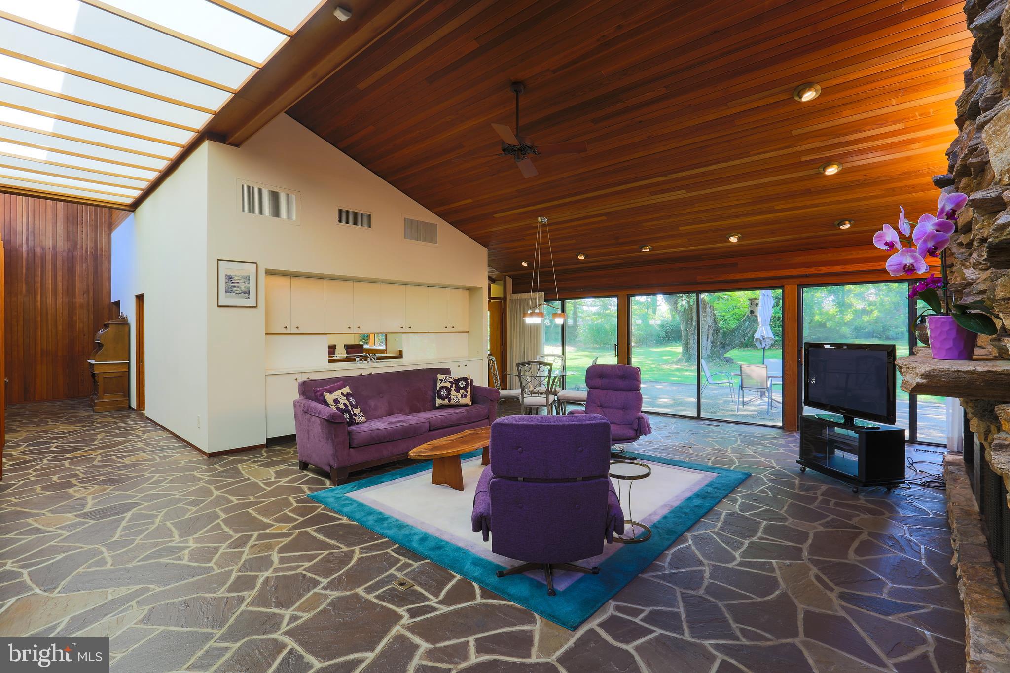 3413 Midfield Road Baltimore, MD 21208 - Photo 8 of 33 Family Room with Vaulted Ceiling and Skylights
