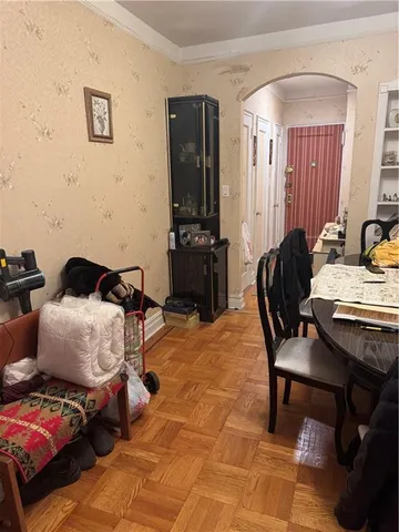 a bedroom with a bed a desk and chair