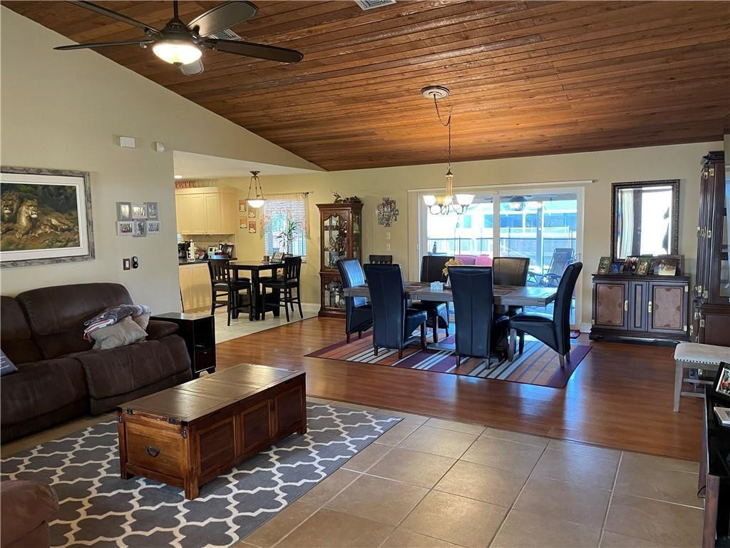 8581 Southwest 27th Place Davie, FL 33328 - Photo 4 of 10 a living room with furniture and wooden floors