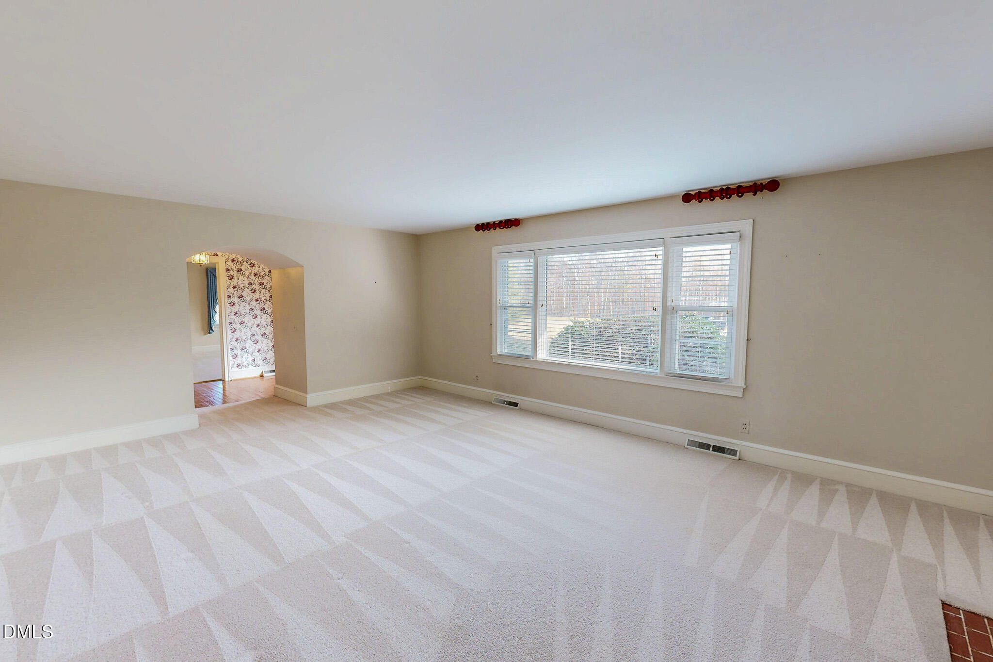 8758 Hurdle Mills Road Hurdle Mills, NC 27541 - Photo 12 of 53 an empty room with windows