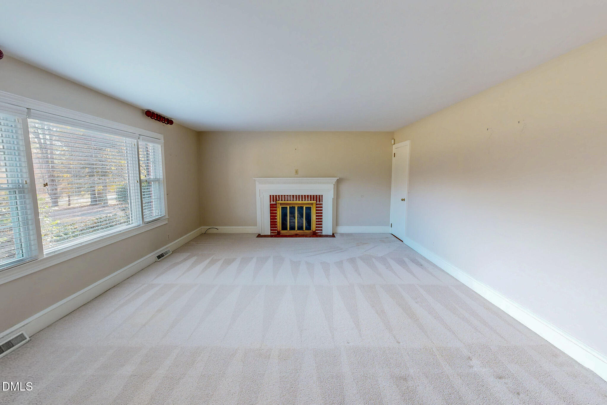 8758 Hurdle Mills Road Hurdle Mills, NC 27541 - Photo 13 of 53 a view of an empty room with a window
