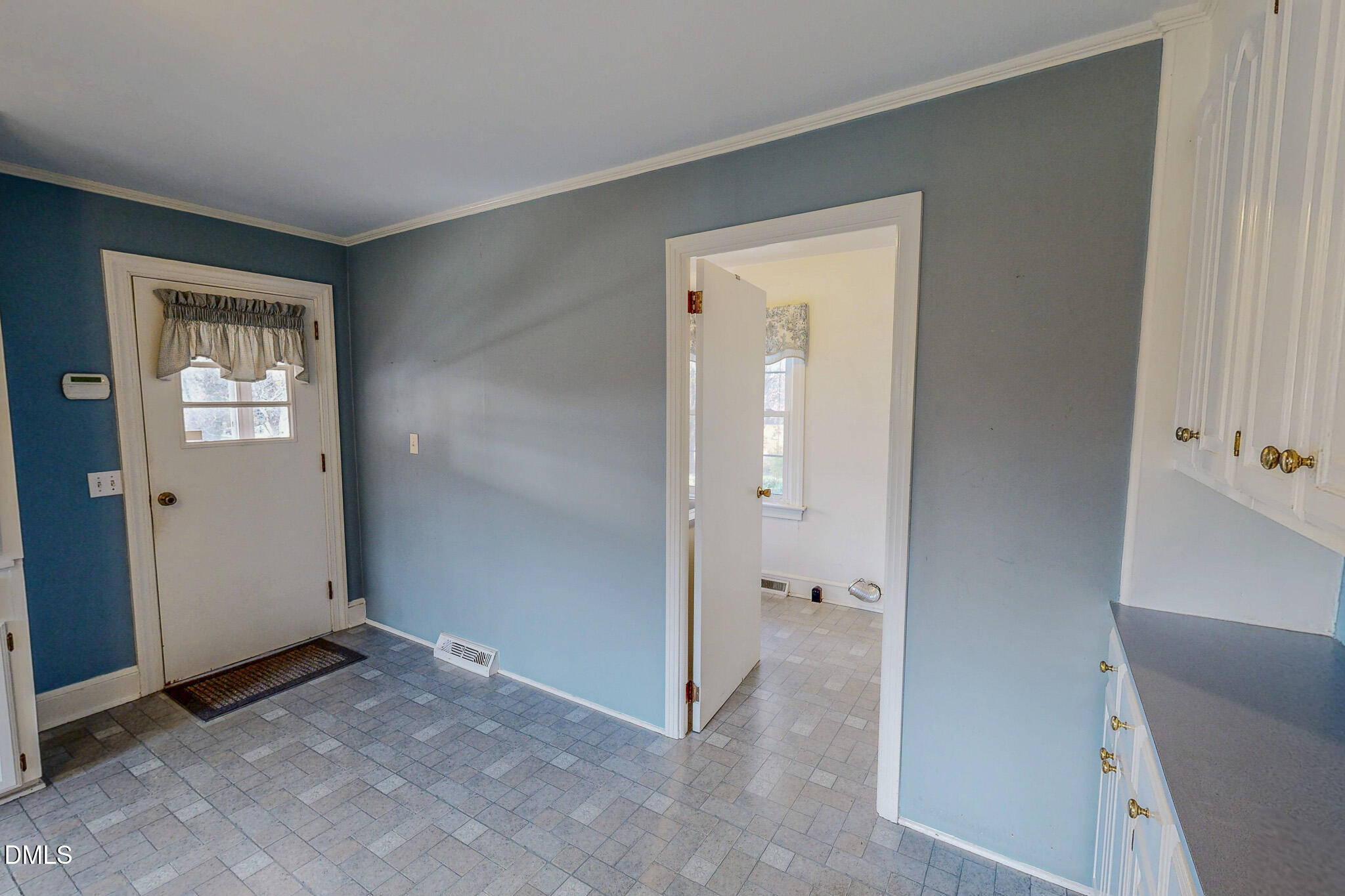 8758 Hurdle Mills Road Hurdle Mills, NC 27541 - Photo 23 of 53 an empty room with windows and closet