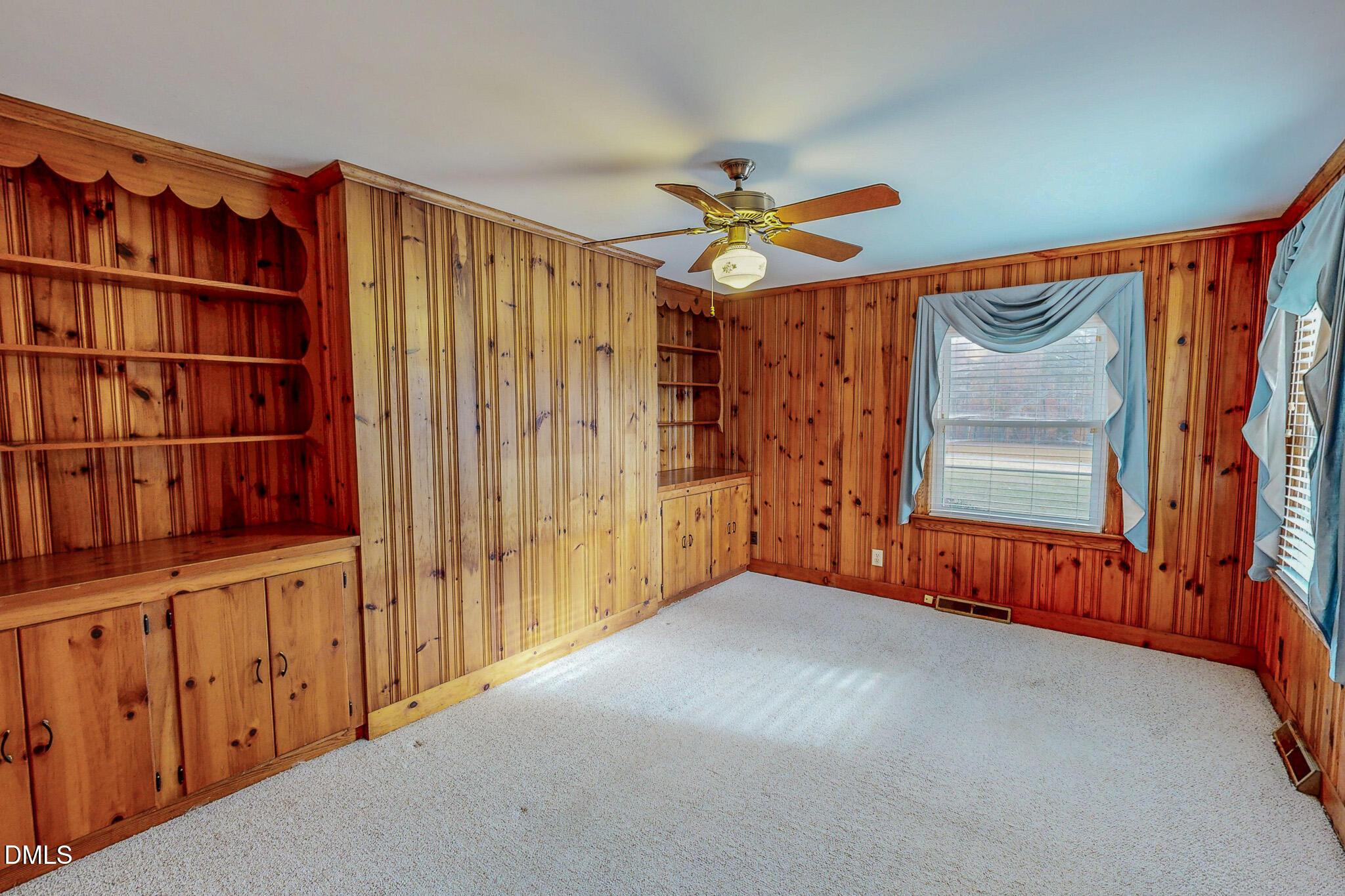 8758 Hurdle Mills Road Hurdle Mills, NC 27541 - Photo 24 of 53 a view of an empty room with a window
