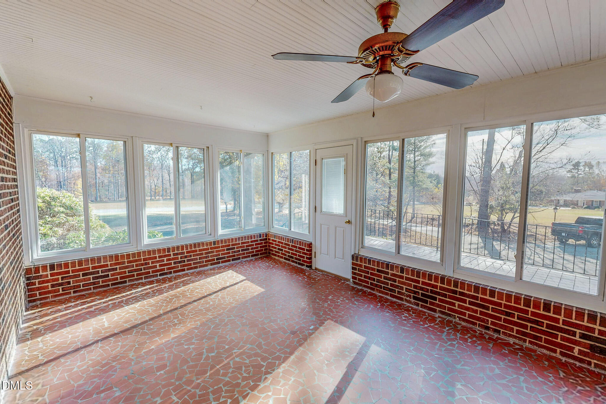 8758 Hurdle Mills Road Hurdle Mills, NC 27541 - Photo 4 of 53 a living room with a large bed and a window