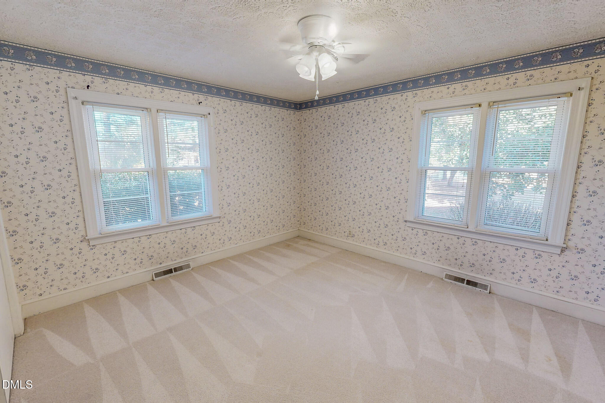 8758 Hurdle Mills Road Hurdle Mills, NC 27541 - Photo 43 of 53 a view of an empty room with a window