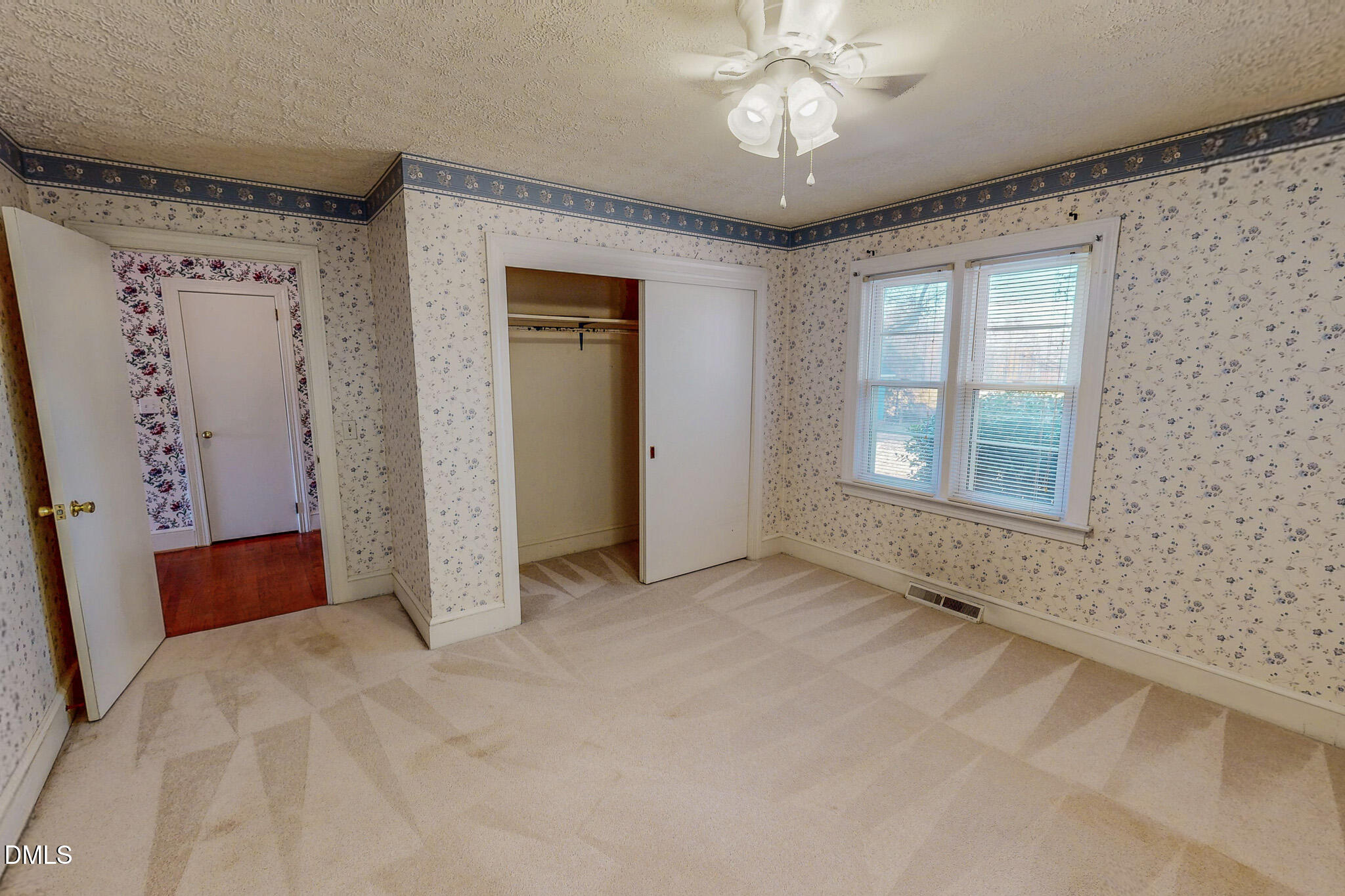 8758 Hurdle Mills Road Hurdle Mills, NC 27541 - Photo 44 of 53 a view of an empty room with a window