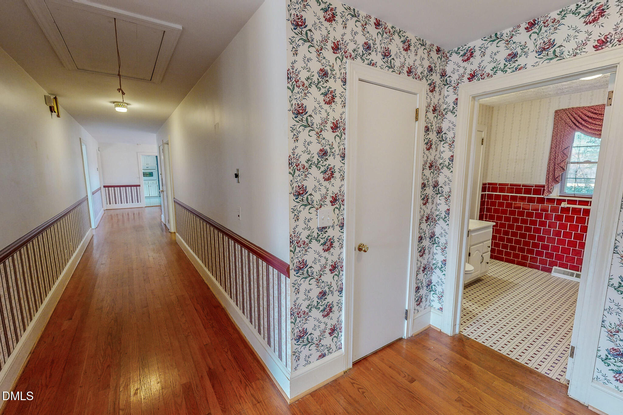 8758 Hurdle Mills Road Hurdle Mills, NC 27541 - Photo 45 of 53 a view of a hallway with wooden floor and staircase
