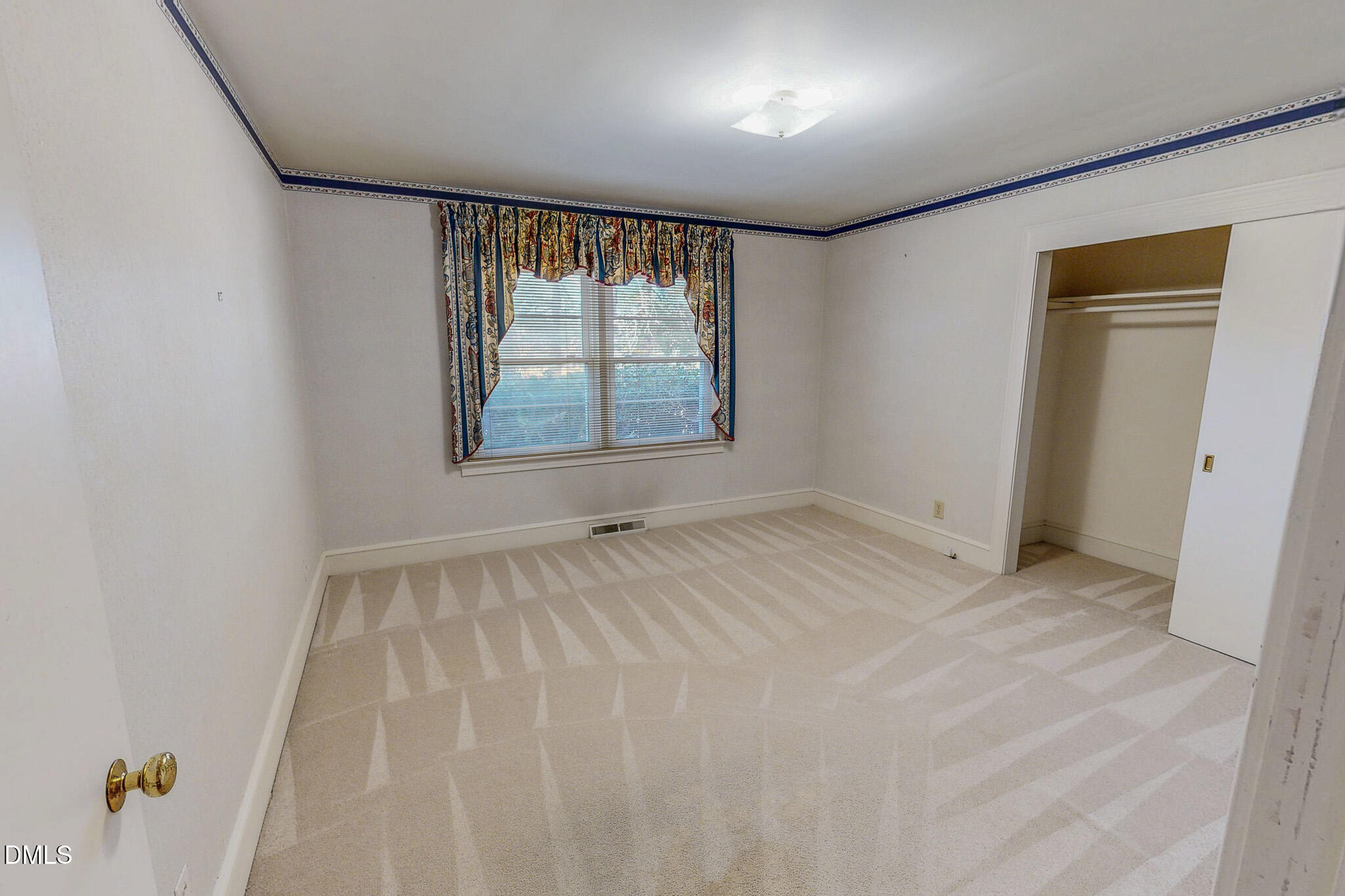 8758 Hurdle Mills Road Hurdle Mills, NC 27541 - Photo 48 of 53 an empty room with a window