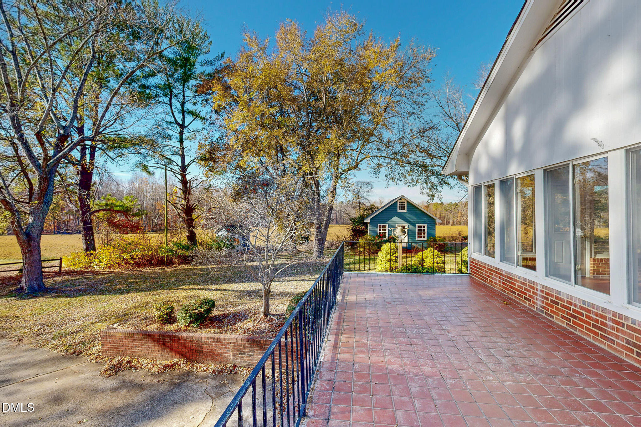8758 Hurdle Mills Road Hurdle Mills, NC 27541 - Photo 5 of 53 a view of a house with a yard