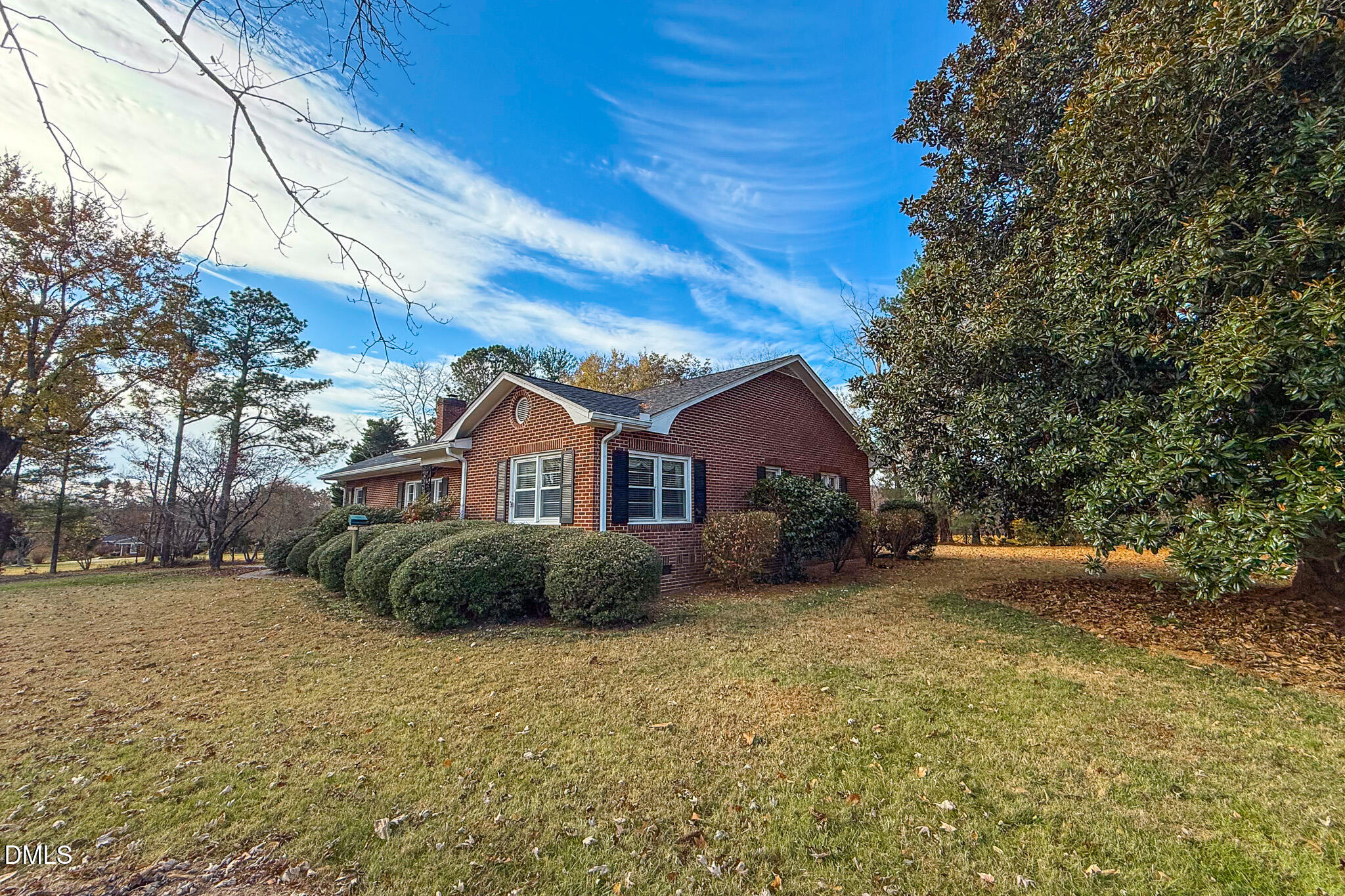8758 Hurdle Mills Road Hurdle Mills, NC 27541 - Photo 53 of 53 a view of a house with a yard
