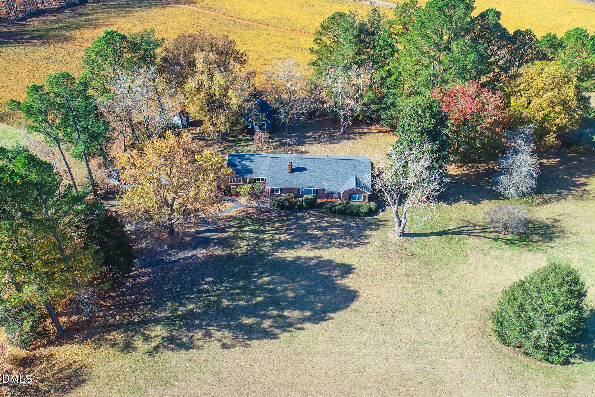 8758 Hurdle Mills Road Hurdle Mills, NC 27541 - Photo 9 of 53 a view of a house with a yard