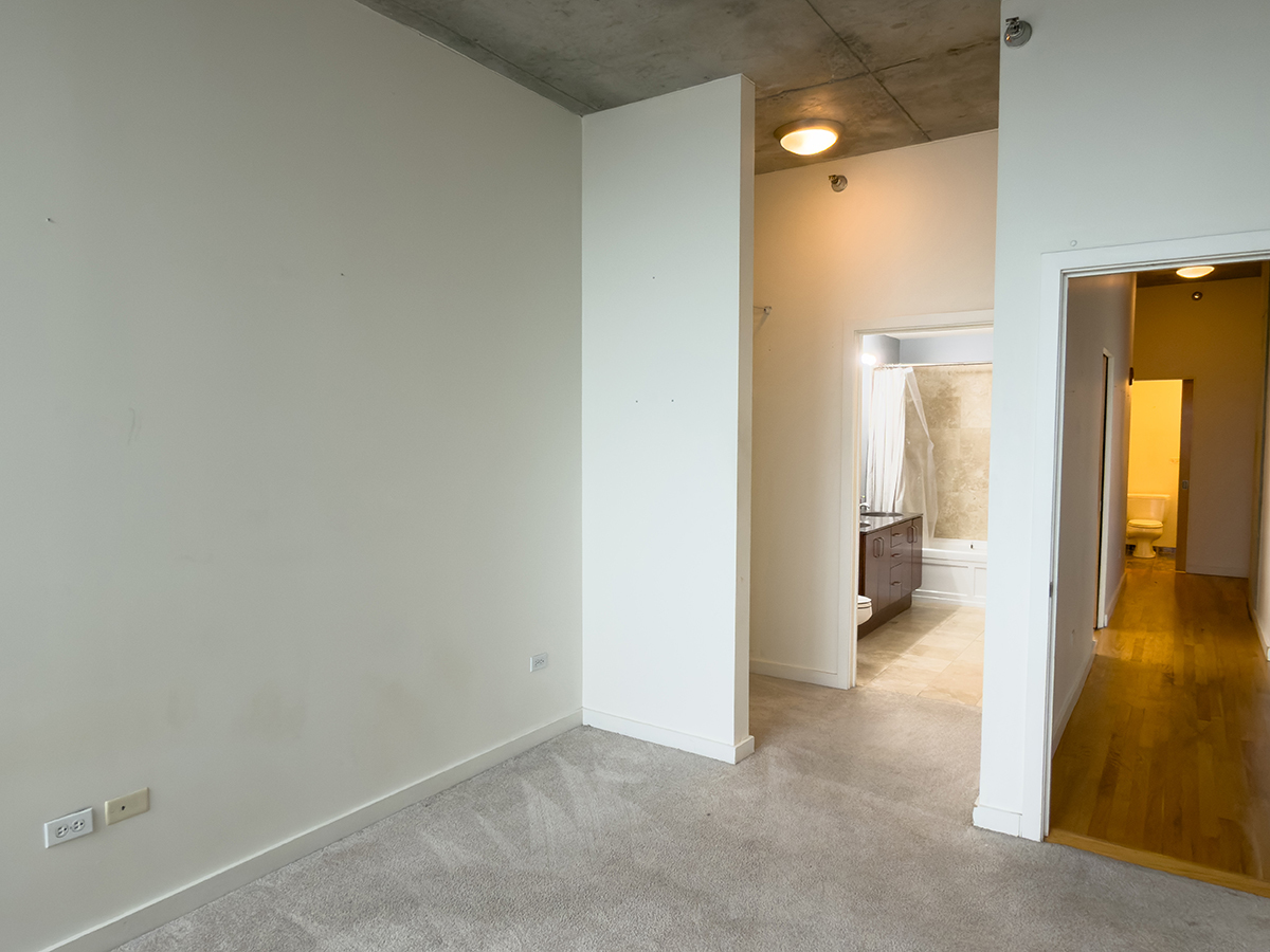 1720 South Michigan Avenue, Unit 3002 Chicago, IL 60616 - Photo 12 of 22 a view of a room with a wardrobe space