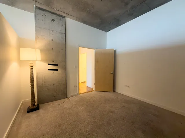 a view of hallway with a room