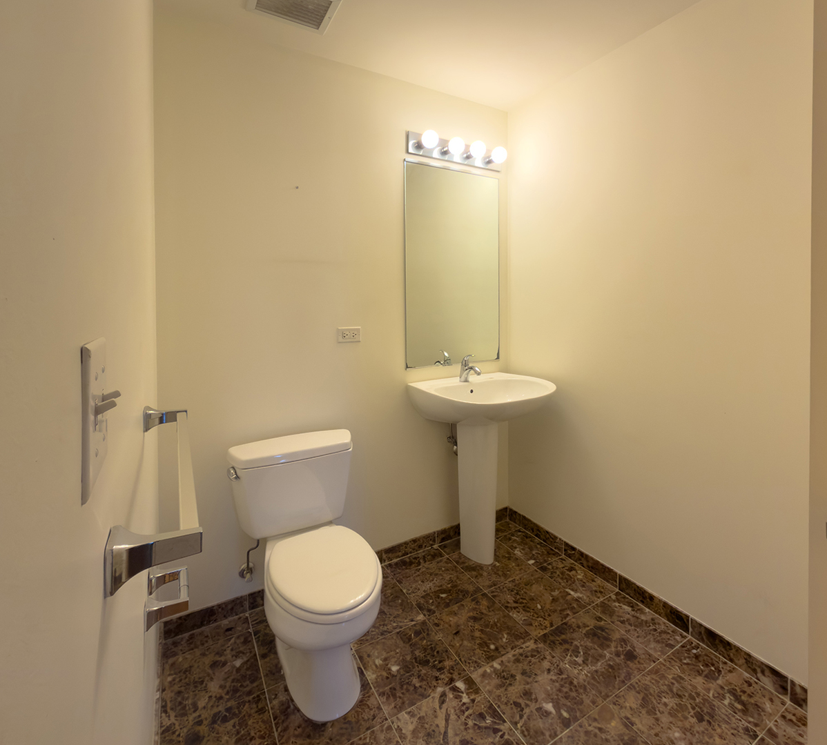 1720 South Michigan Avenue, Unit 3002 Chicago, IL 60616 - Photo 18 of 22 a bathroom with a toilet and a sink