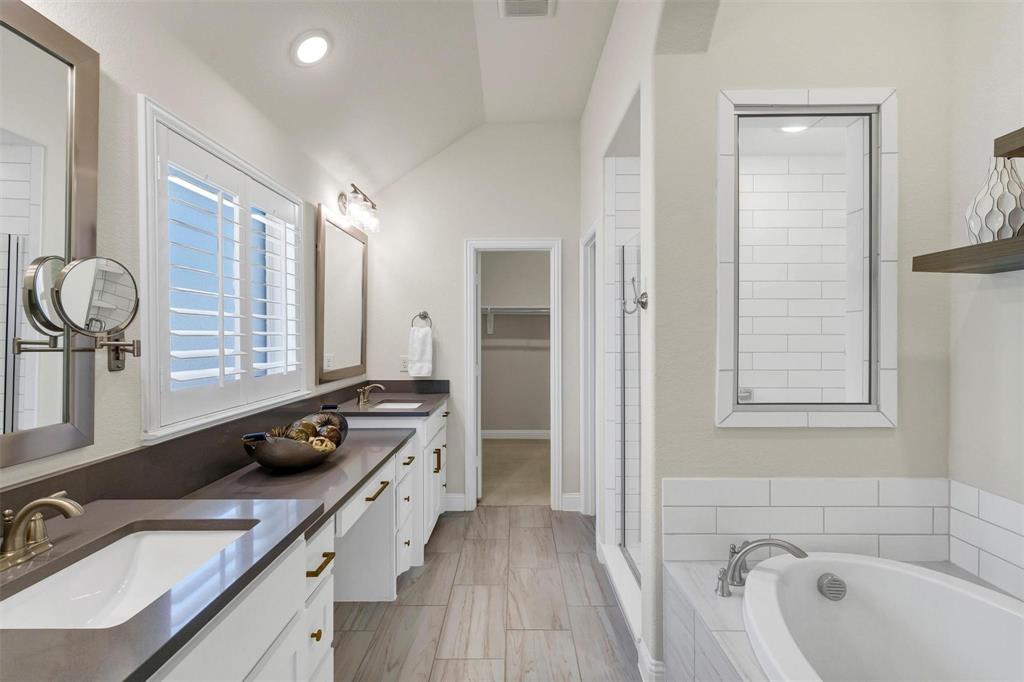 1928 Crested Ridge Road Fort Worth, TX 76008 - Photo 12 of 29 a kitchen with a sink stove and cabinets