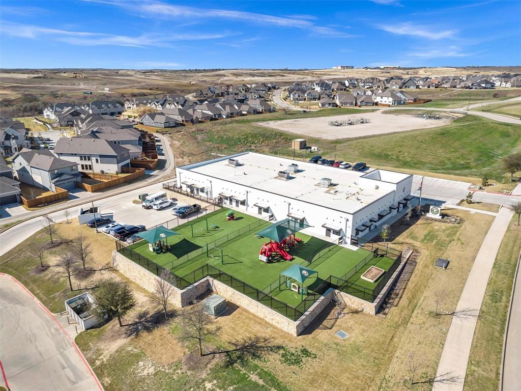 1928 Crested Ridge Road Fort Worth, TX 76008 - Photo 25 of 29 an aerial view of a