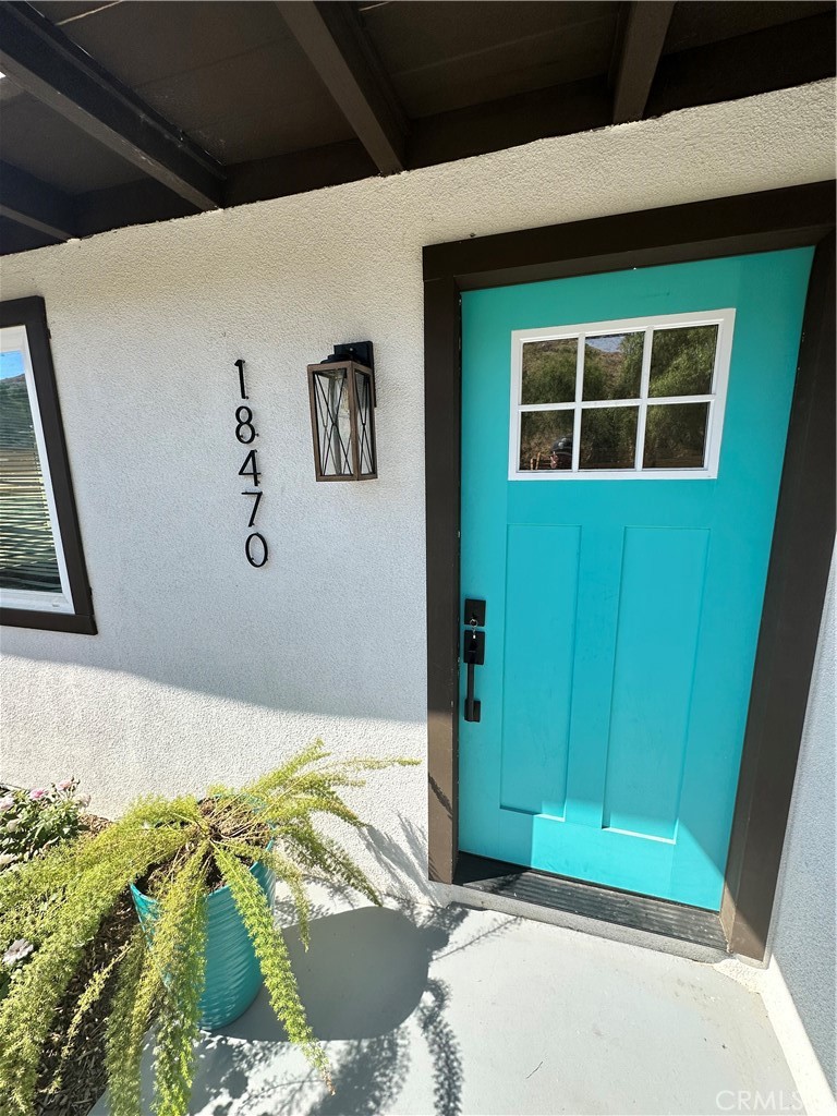 18470 7th Street Bloomington, CA 92316 - Photo 3 of 45 a front view of a house