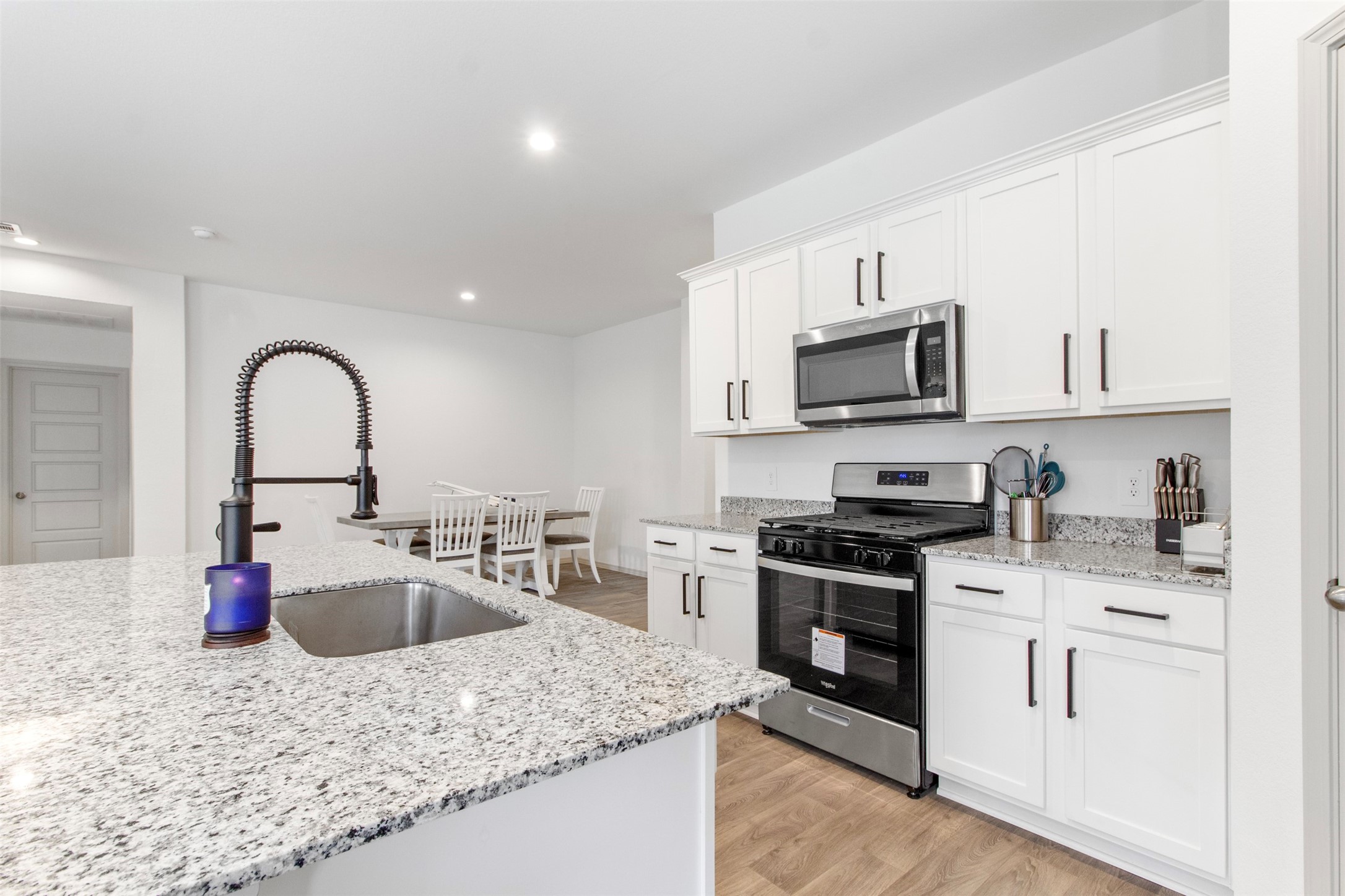 6685 Riplee Street Beaumont, TX 77713 - Photo 10 of 29 Upgraded kitchen design with pulls and faucet.