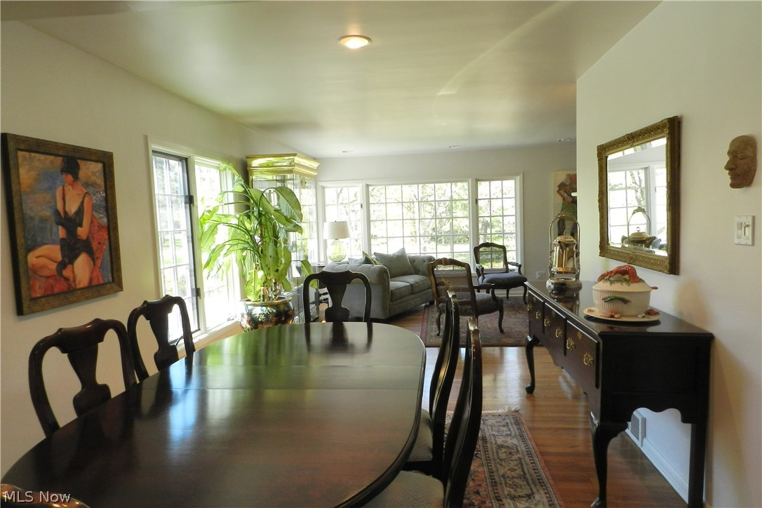 The afternoon sun lends a soft glow to the living and dining rooms.