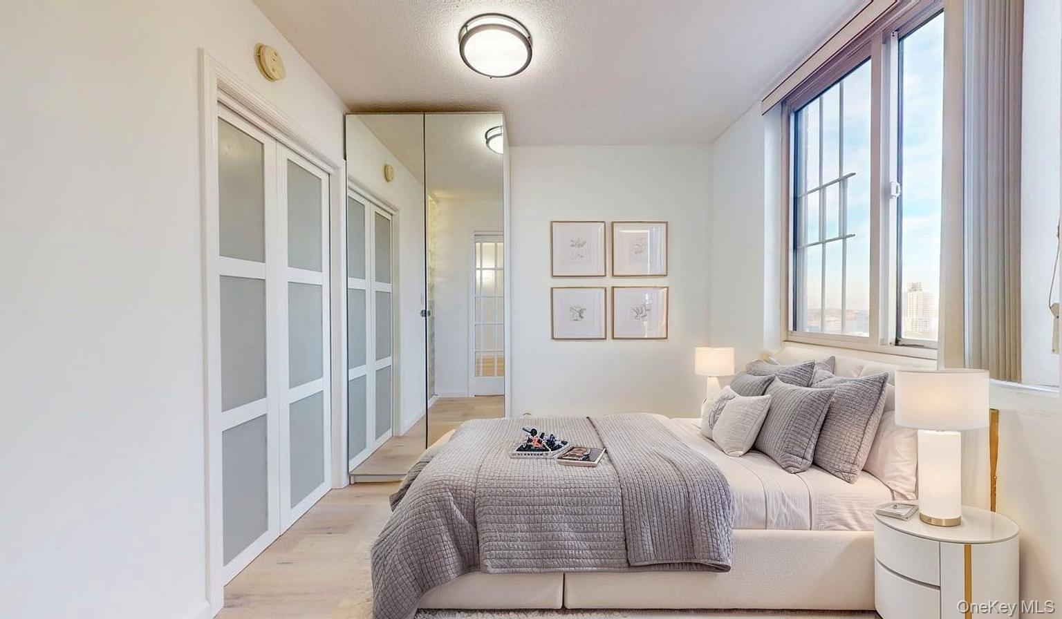 118-17 Union Turnpike, Unit 18H Queens, NY 11375 - Photo 27 of 49 Bedroom with light wood finished floors