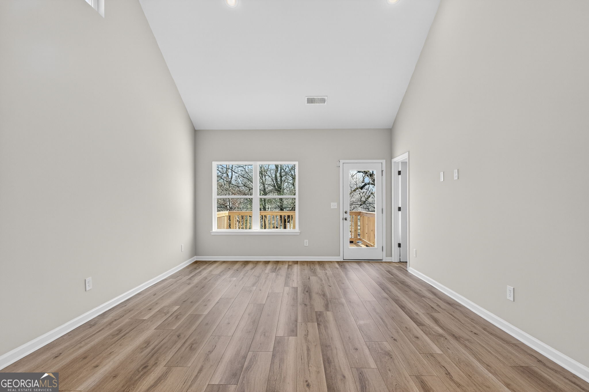 468 South Bolee Road Hogansville, GA 30230 - Photo 11 of 25 wooden floor in an empty room with a window