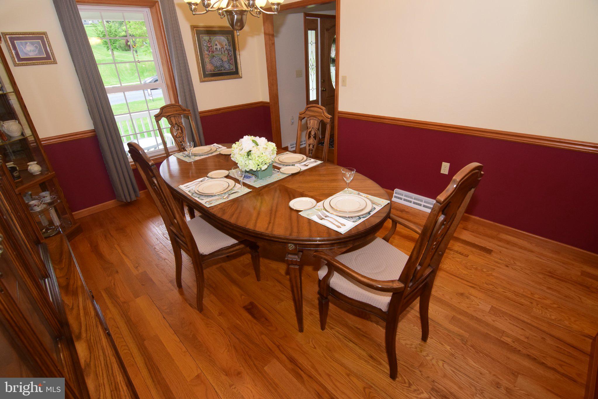 470 Millgate Road Bellefonte, PA 16823 - Photo 27 of 63 a view of a dining room with furniture and wooden floor