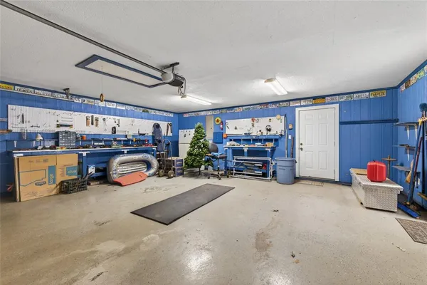 a view of a garage with furniture