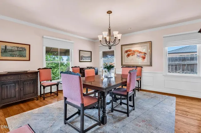 a kitchen with granite countertop stainless steel appliances a stove a sink and a refrigerator