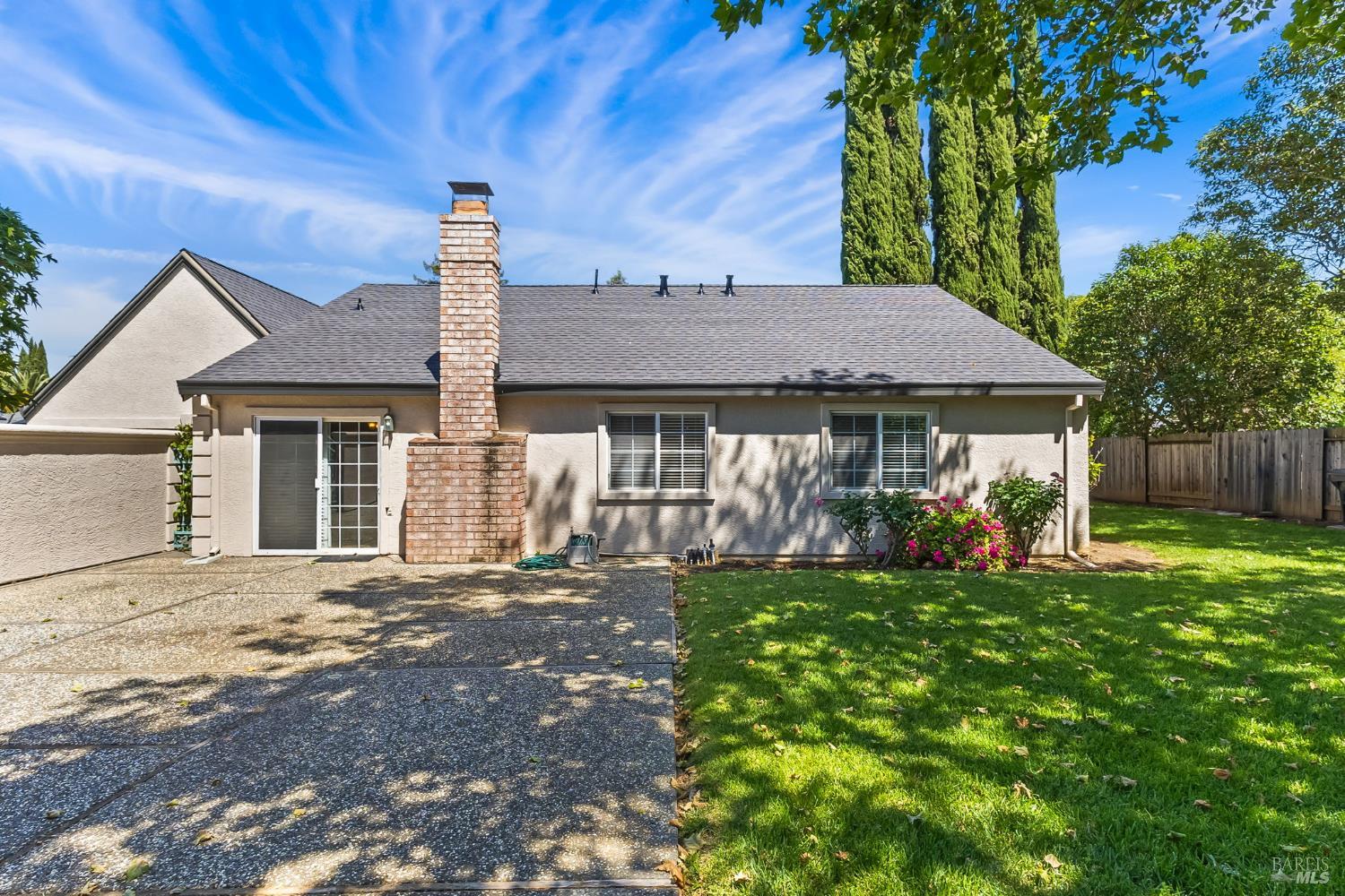 2177 Vista Del Rancho Fairfield, CA 94534 - Photo 26 of 28 a front view of a house with a garden and trees
