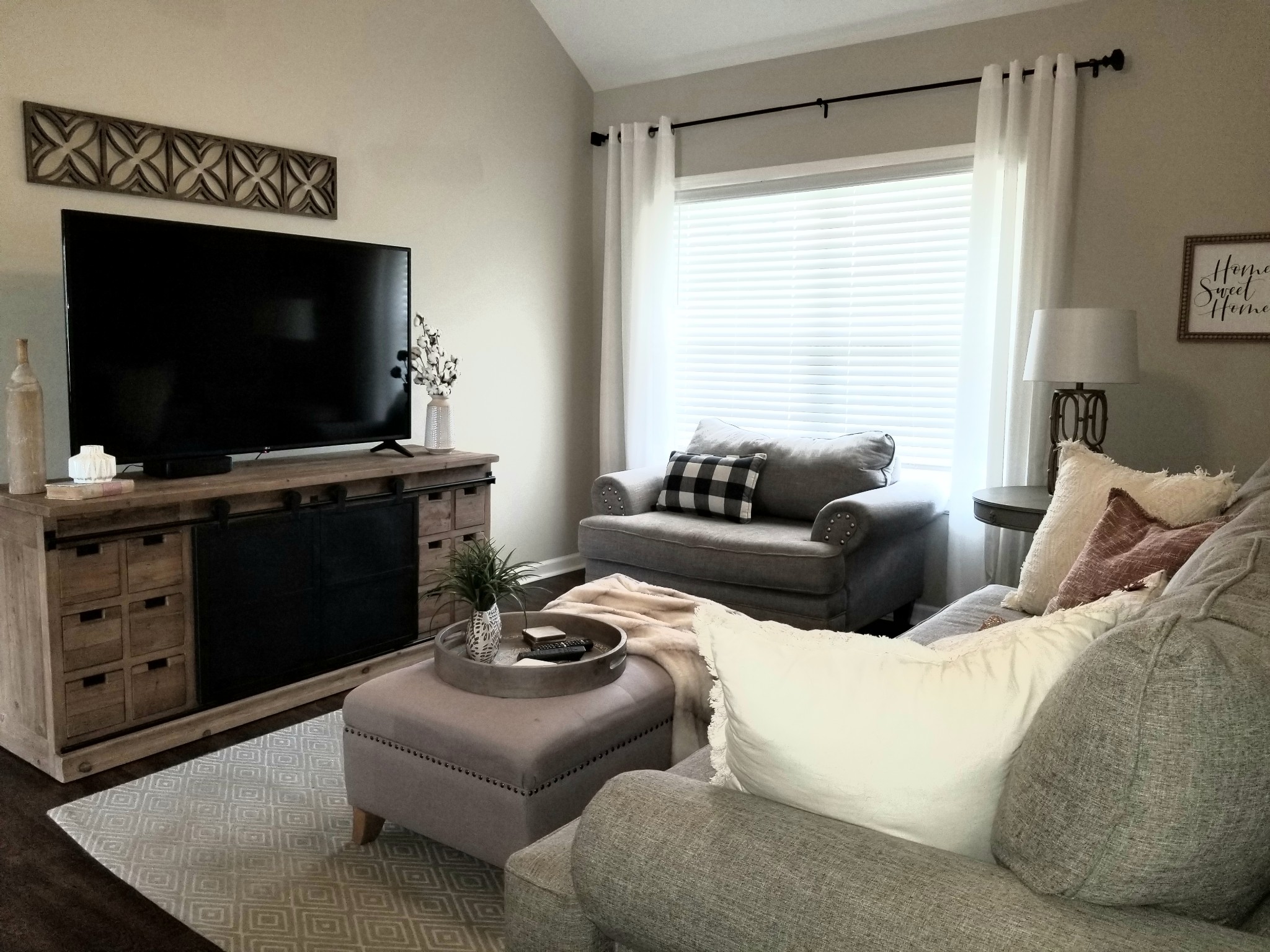 145 A T G T Road Portland, TN 37148 - Photo 11 of 41 a living room with furniture and a flat screen tv