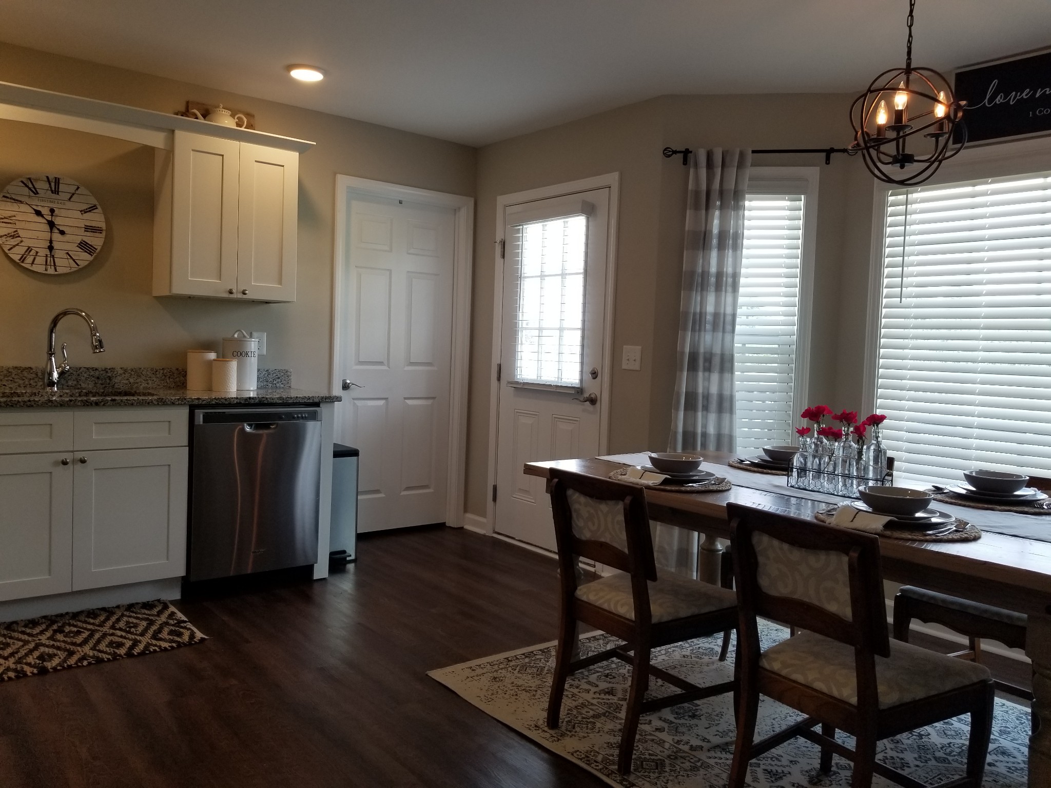 145 A T G T Road Portland, TN 37148 - Photo 13 of 41 a kitchen with sink dining table and chairs