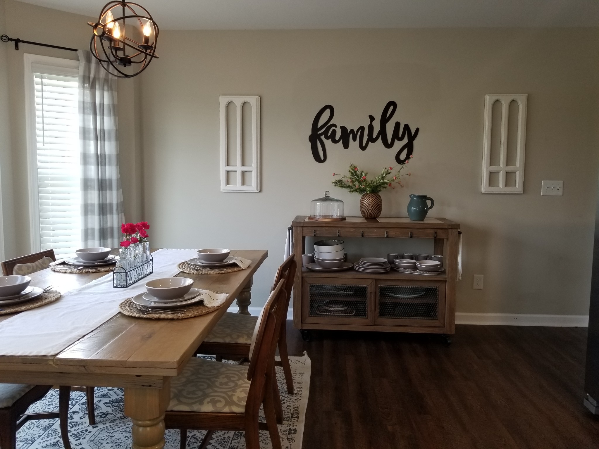 145 A T G T Road Portland, TN 37148 - Photo 16 of 41 a view of a dining room with furniture wooden floor and a chandelier