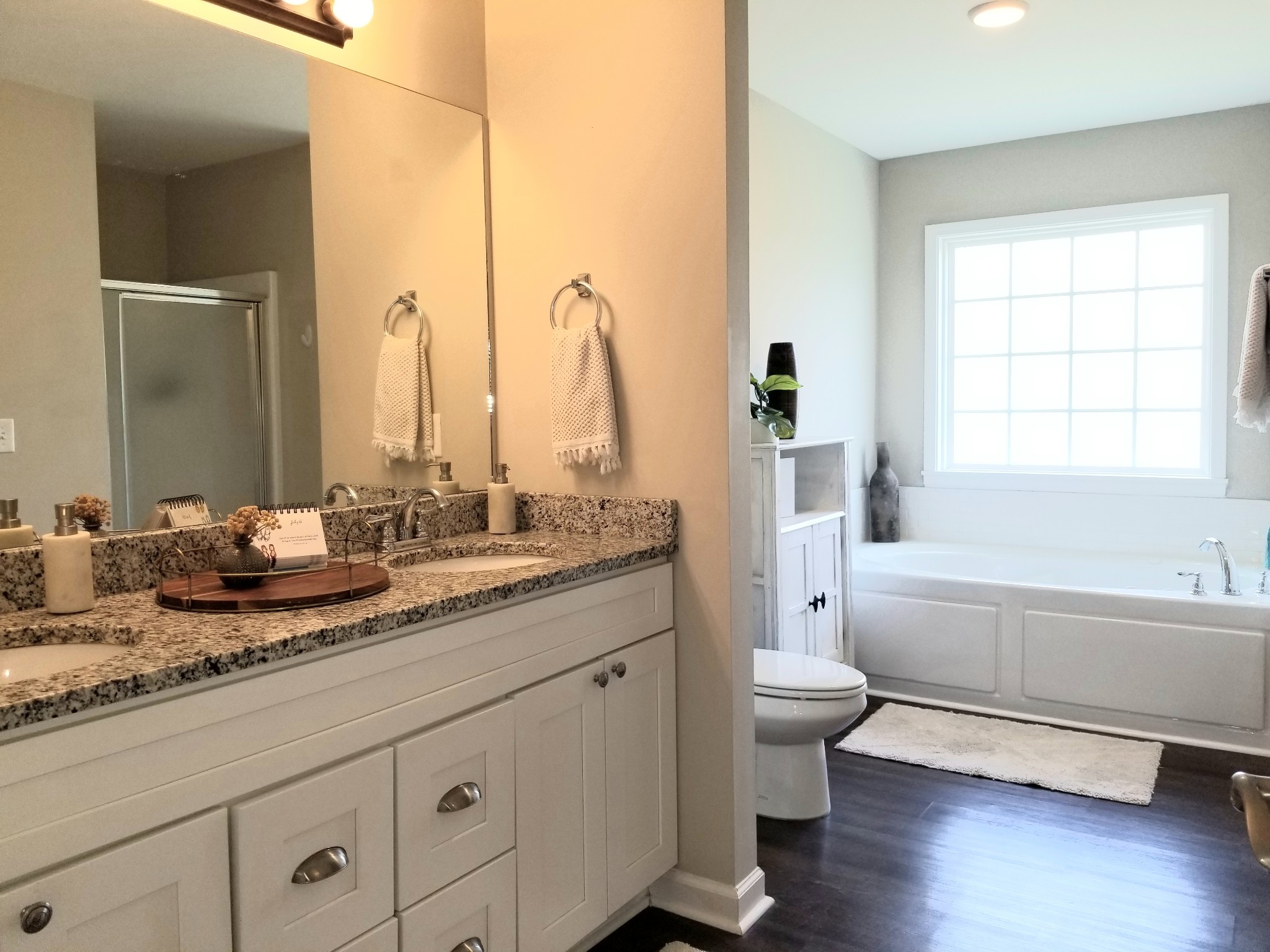 145 A T G T Road Portland, TN 37148 - Photo 22 of 41 a bathroom with a granite countertop sink toilet and bathtub