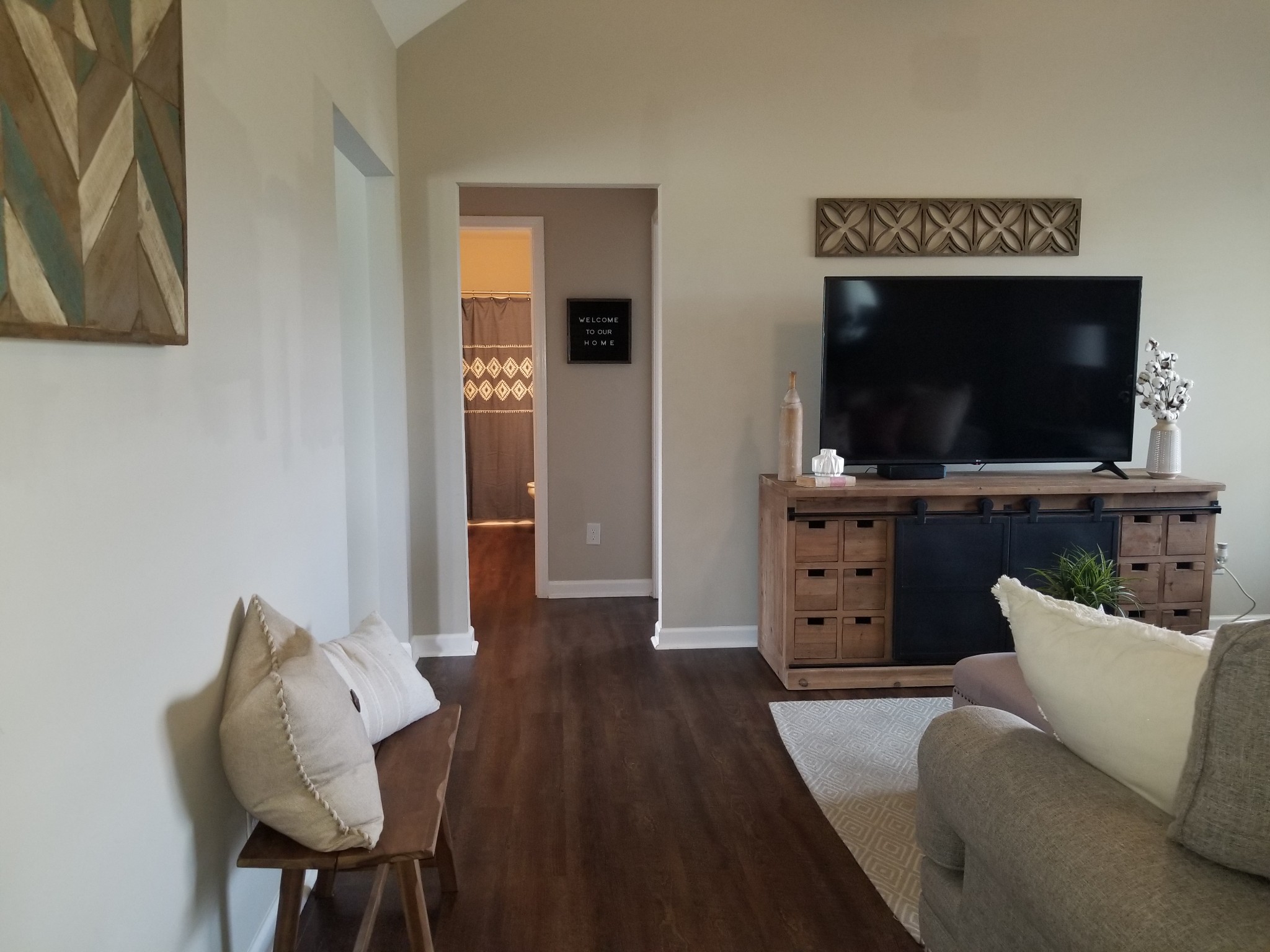 145 A T G T Road Portland, TN 37148 - Photo 26 of 41 a living room with furniture and a flat screen tv