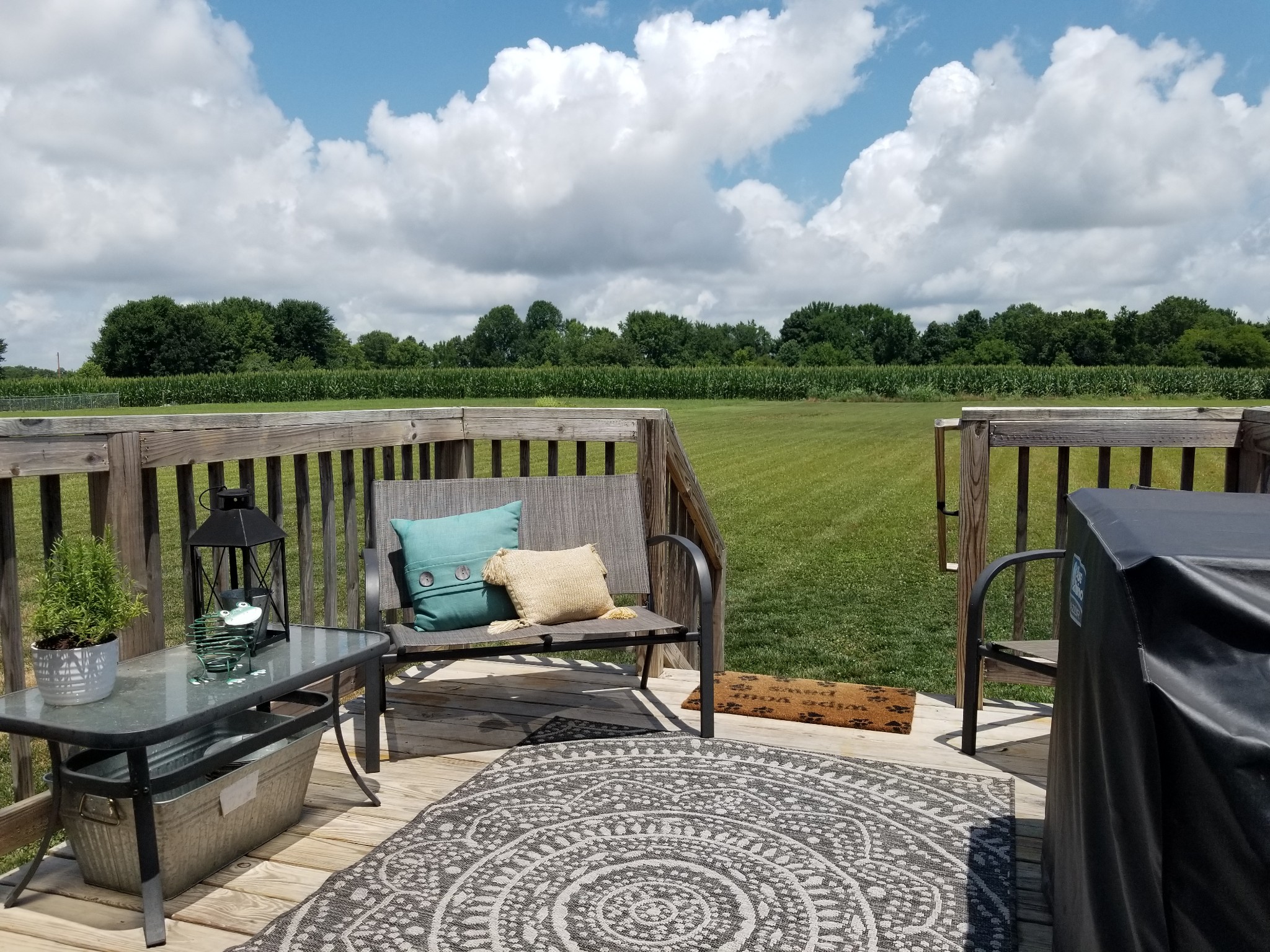 145 A T G T Road Portland, TN 37148 - Photo 32 of 41 a balcony with wooden floor and outdoor seating