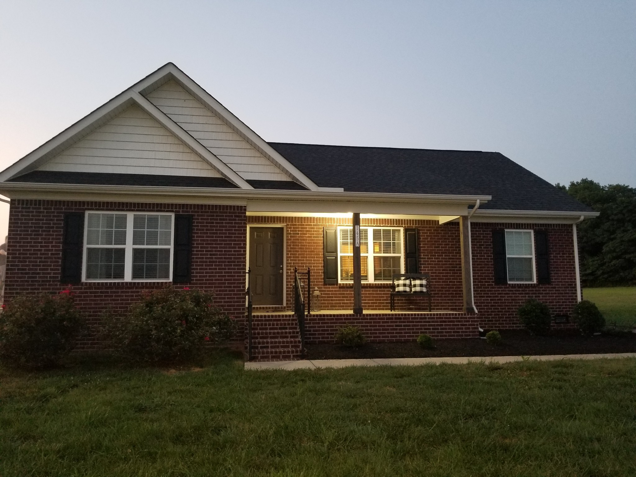 145 A T G T Road Portland, TN 37148 - Photo 40 of 41 front view of a house with a yard