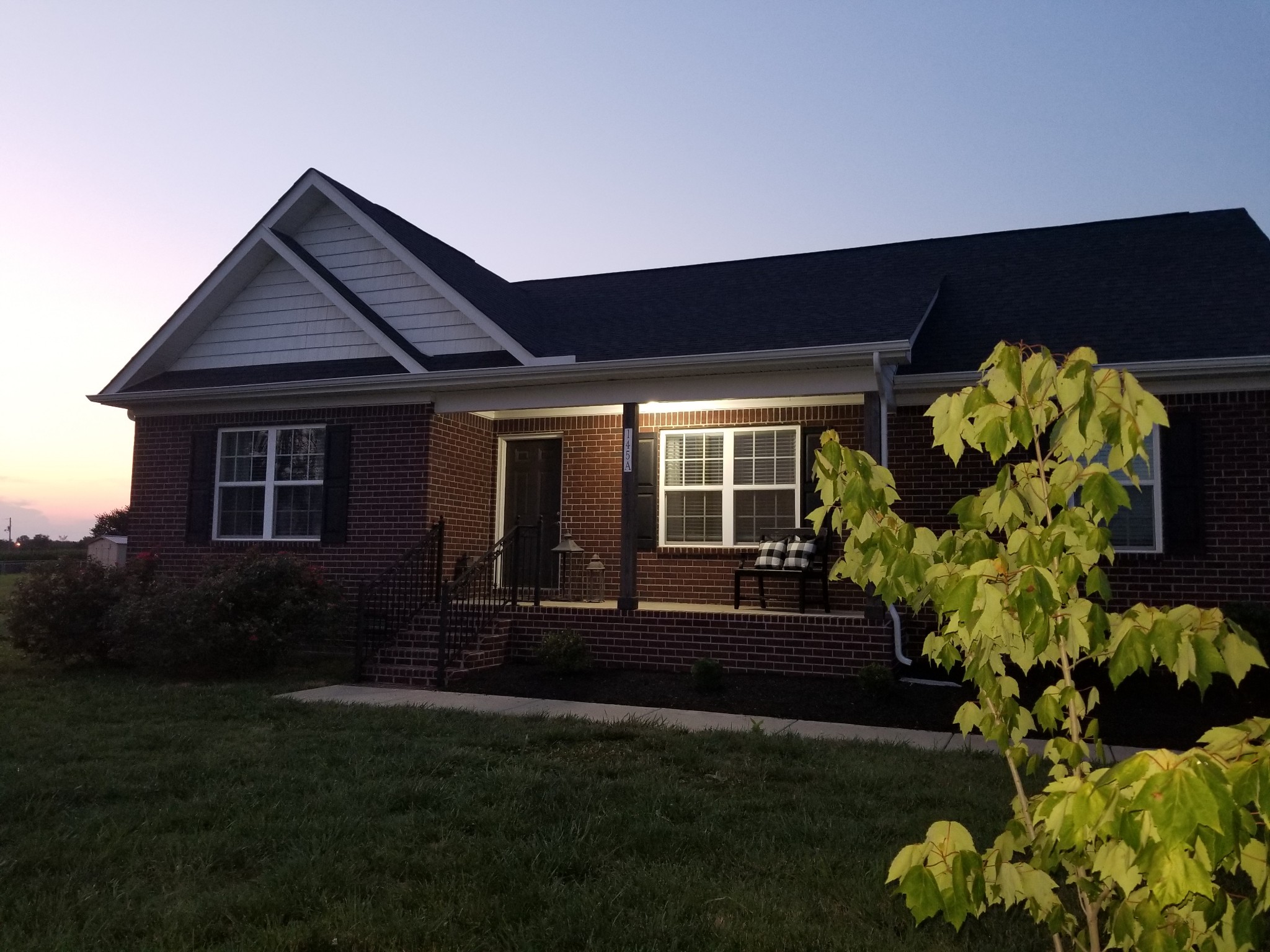 145 A T G T Road Portland, TN 37148 - Photo 41 of 41 a front view of a house with a yard