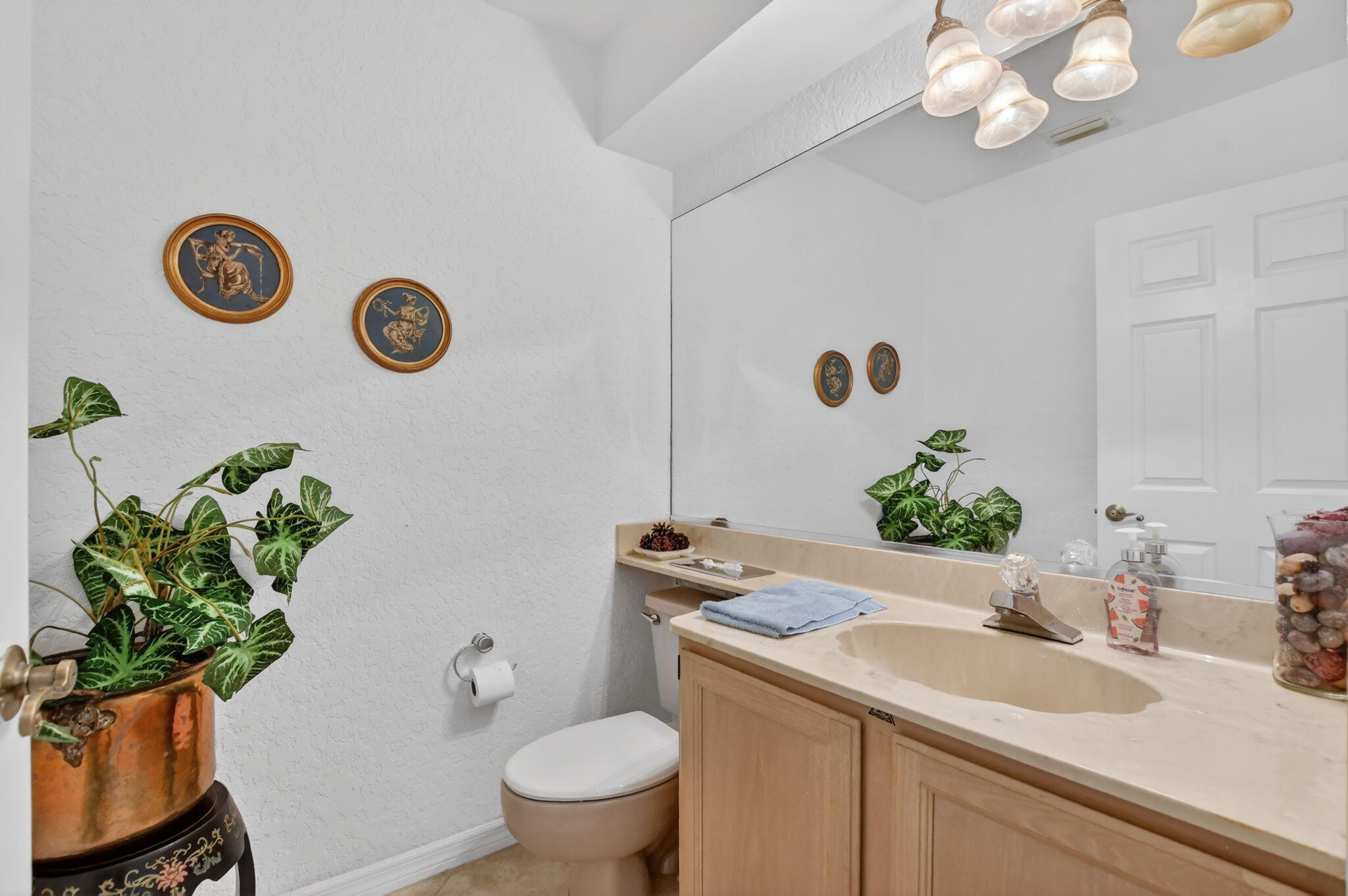 10226 Fresh Meadow Lane Boca Raton, FL 33498 - Photo 18 of 58 a bathroom with a granite countertop sink and a mirror