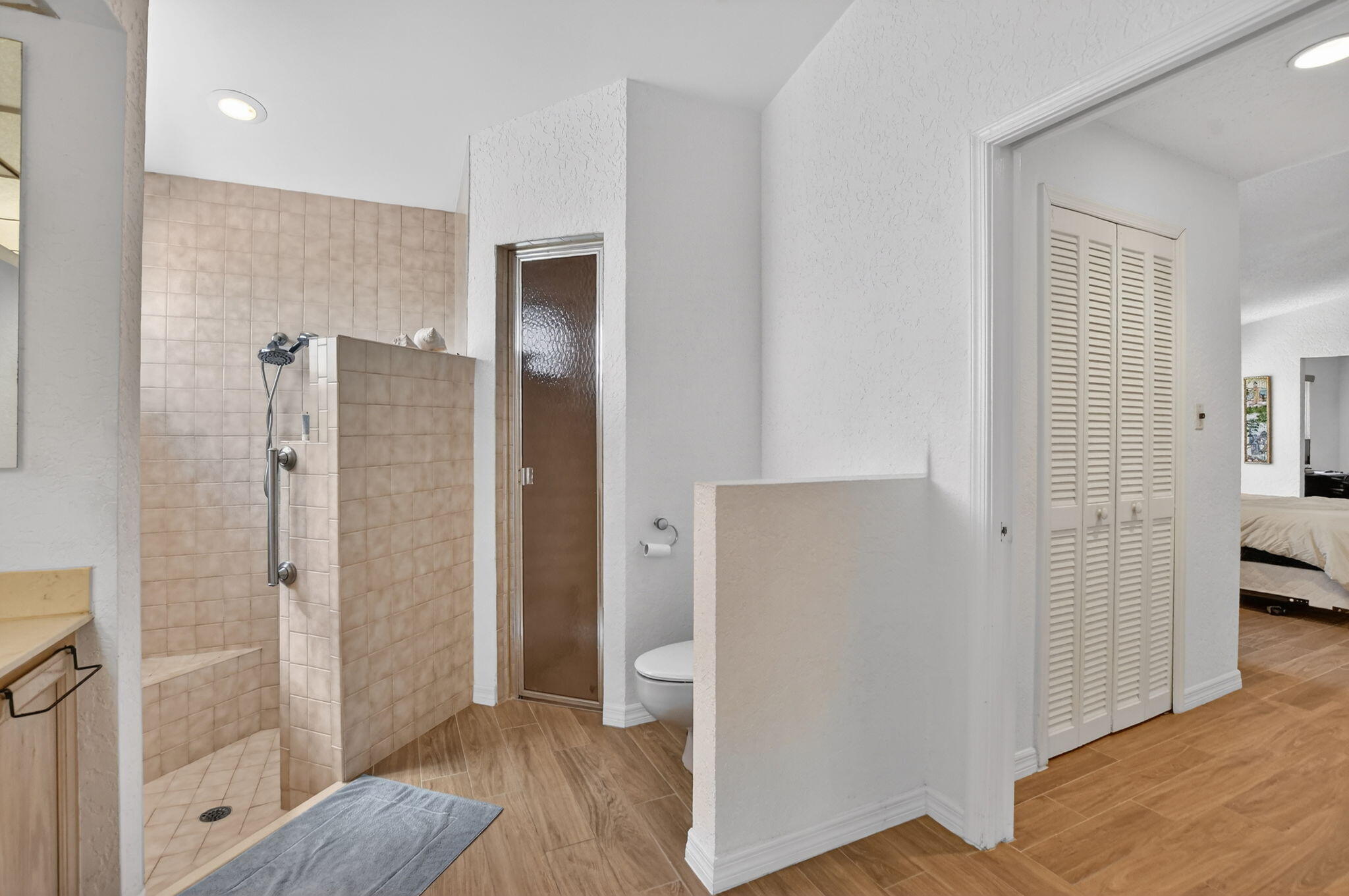 10226 Fresh Meadow Lane Boca Raton, FL 33498 - Photo 27 of 58 a bathroom with a shower toilet and sink