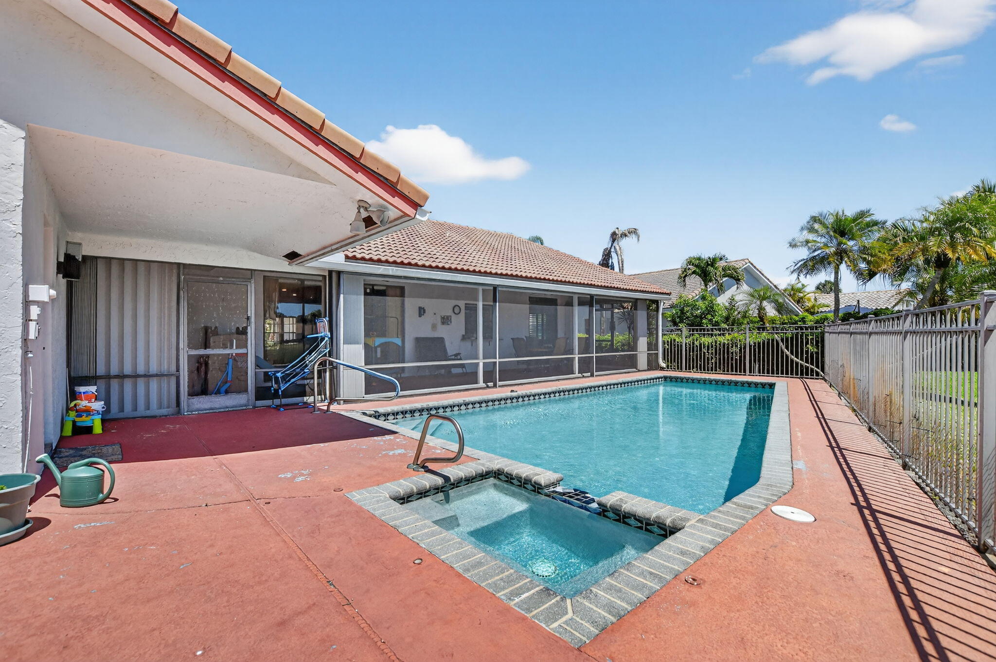 10226 Fresh Meadow Lane Boca Raton, FL 33498 - Photo 43 of 58 a view of a house with backyard patio and swimming pool