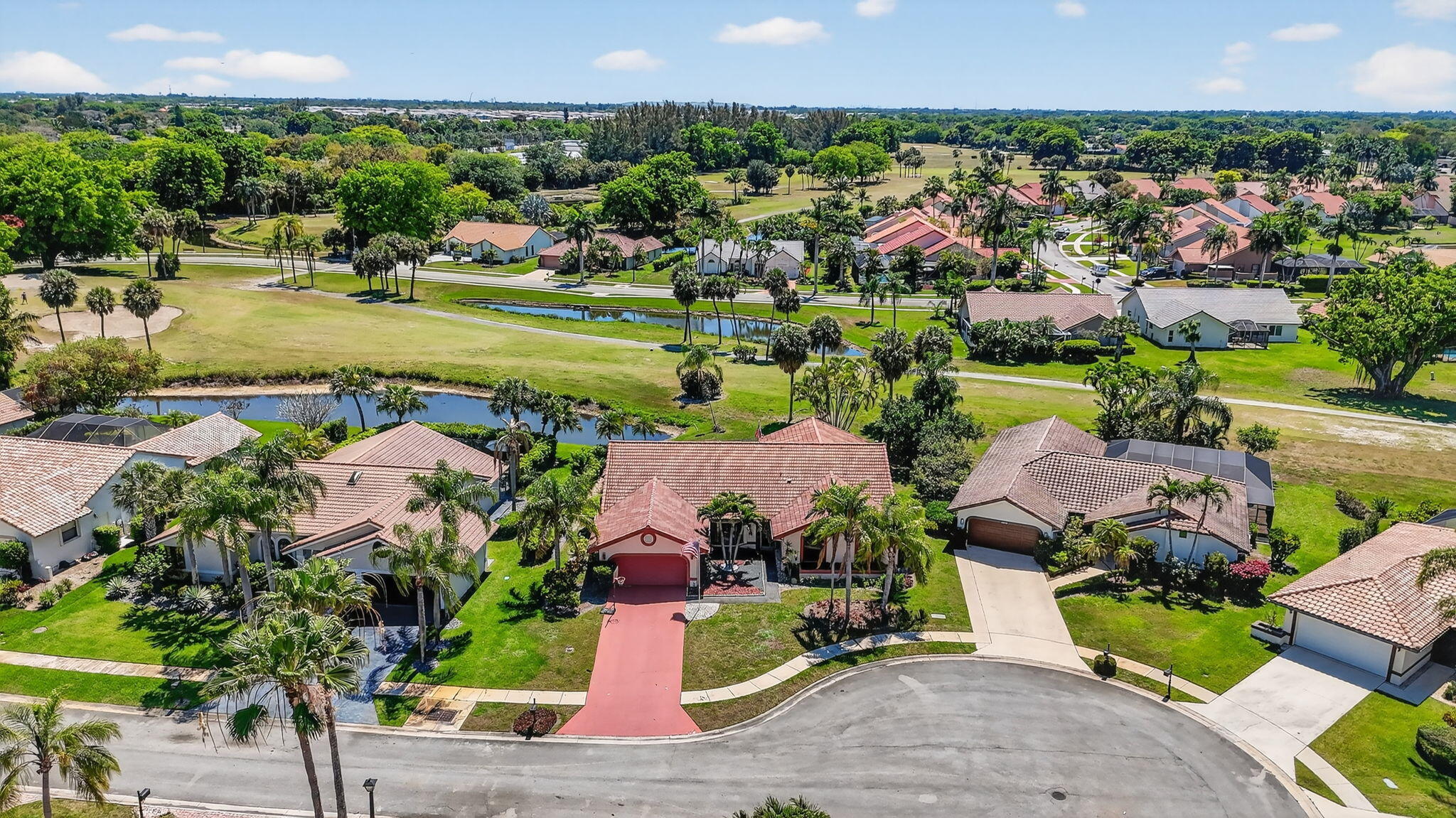 10226 Fresh Meadow Lane Boca Raton, FL 33498 - Photo 49 of 58 an aerial view of a house with a garden