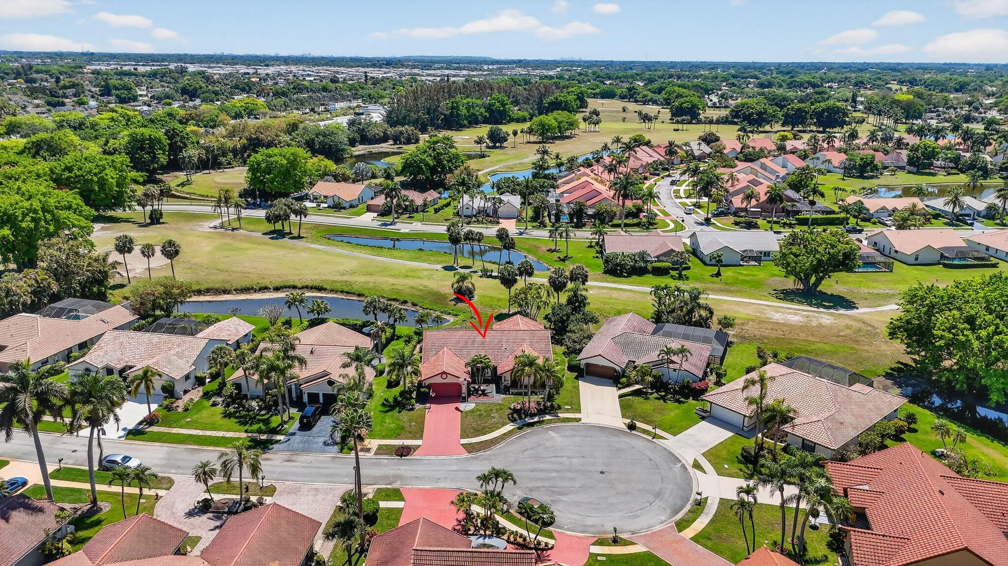 10226 Fresh Meadow Lane Boca Raton, FL 33498 - Photo 50 of 58 an aerial view of a houses with a swimming pool