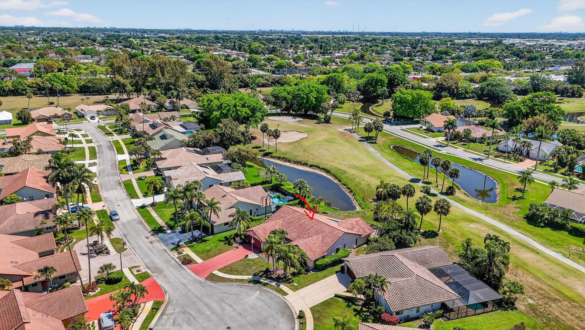 10226 Fresh Meadow Lane Boca Raton, FL 33498 - Photo 51 of 58 an aerial view of a houses with a swimming pool