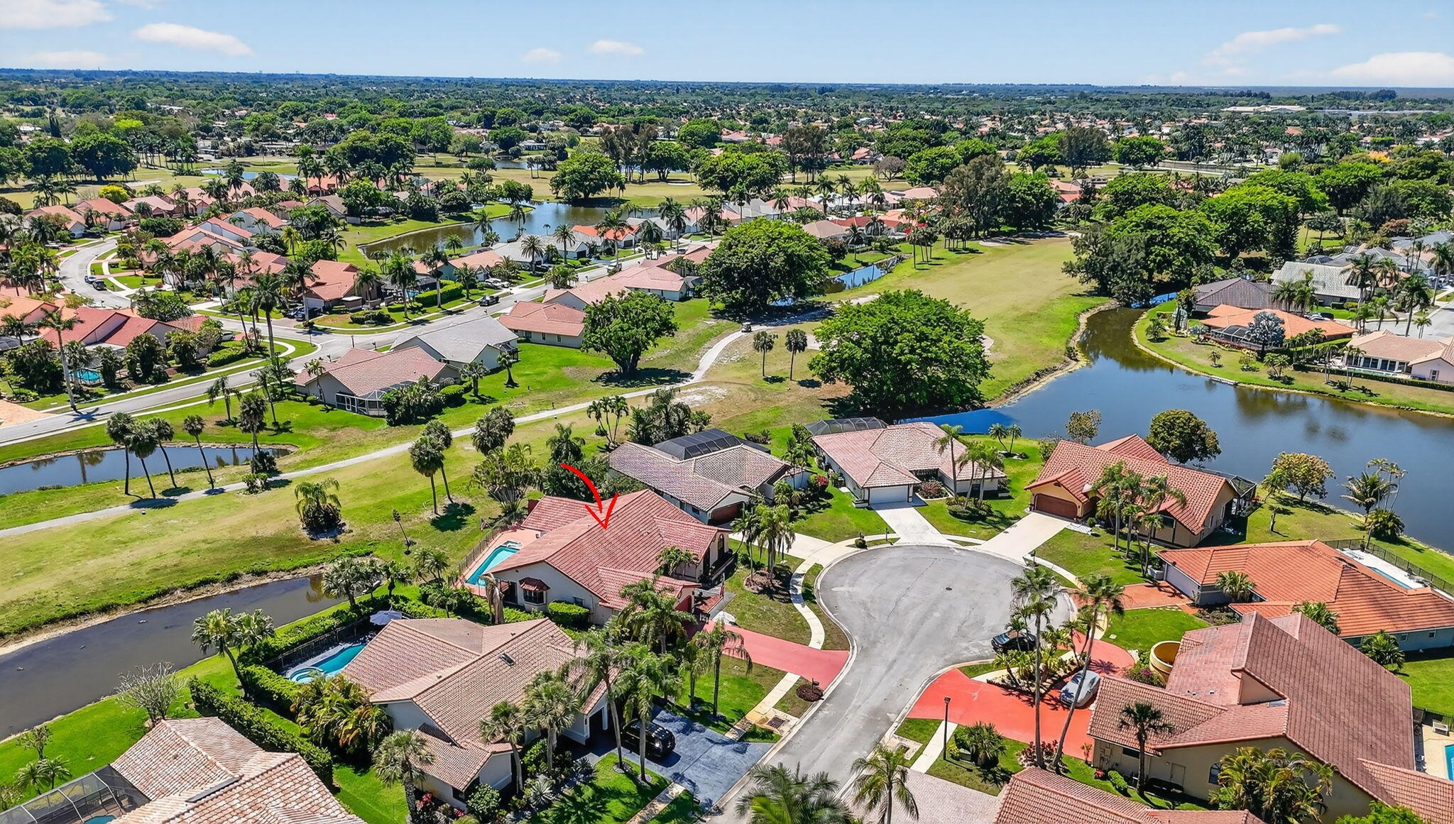 10226 Fresh Meadow Lane Boca Raton, FL 33498 - Photo 52 of 58 an aerial view of residential houses with outdoor space