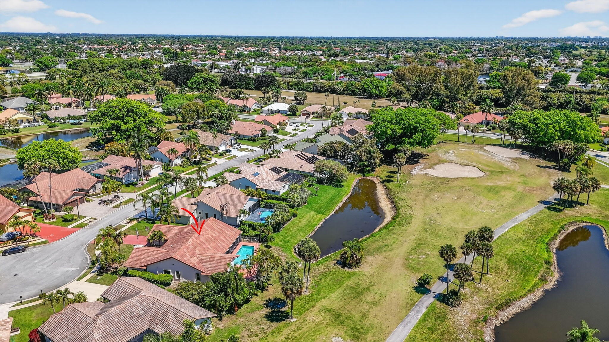 10226 Fresh Meadow Lane Boca Raton, FL 33498 - Photo 54 of 58 an aerial view of residential houses with outdoor space and swimming pool