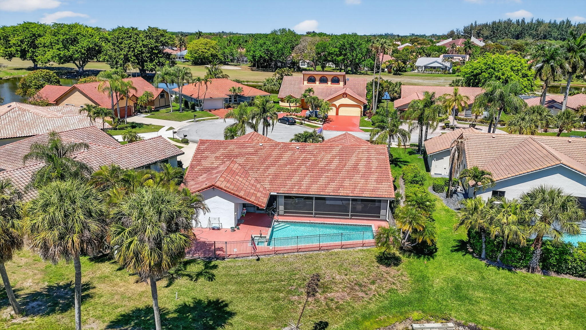 10226 Fresh Meadow Lane Boca Raton, FL 33498 - Photo 57 of 58 an aerial view of house with swimming pool outdoor seating and yard